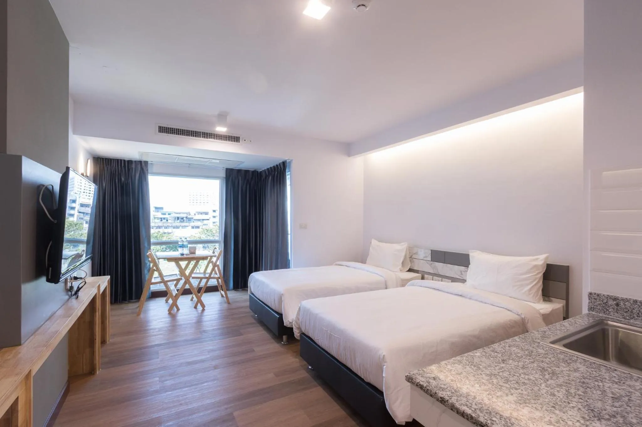 Bed in The Key Point Hotel