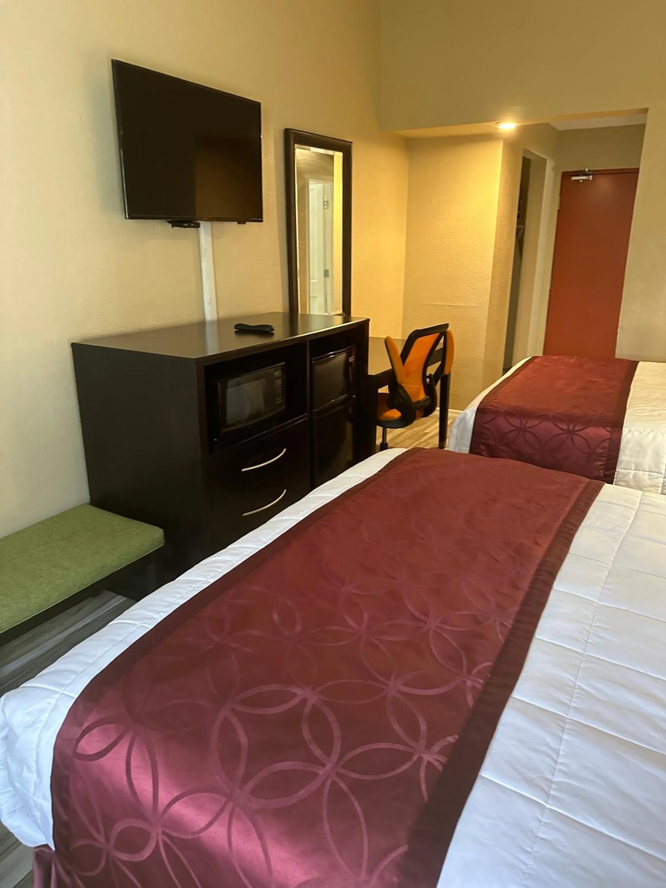 Bed in A-1 Budget Motel