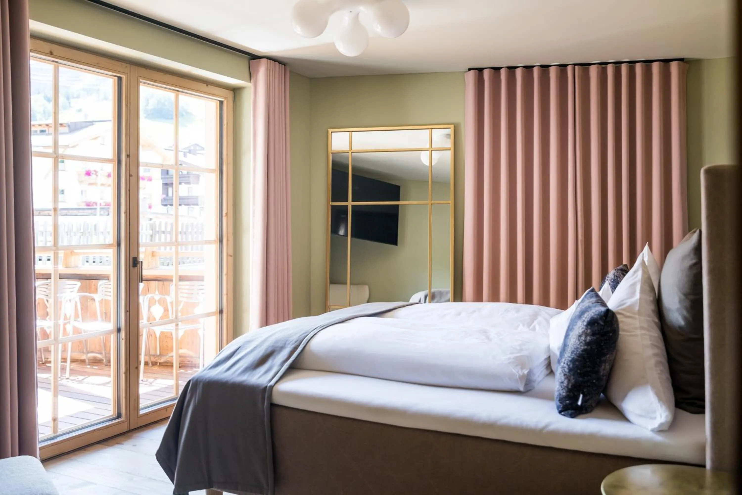 Bed in Raffl's Tyrol Hotel