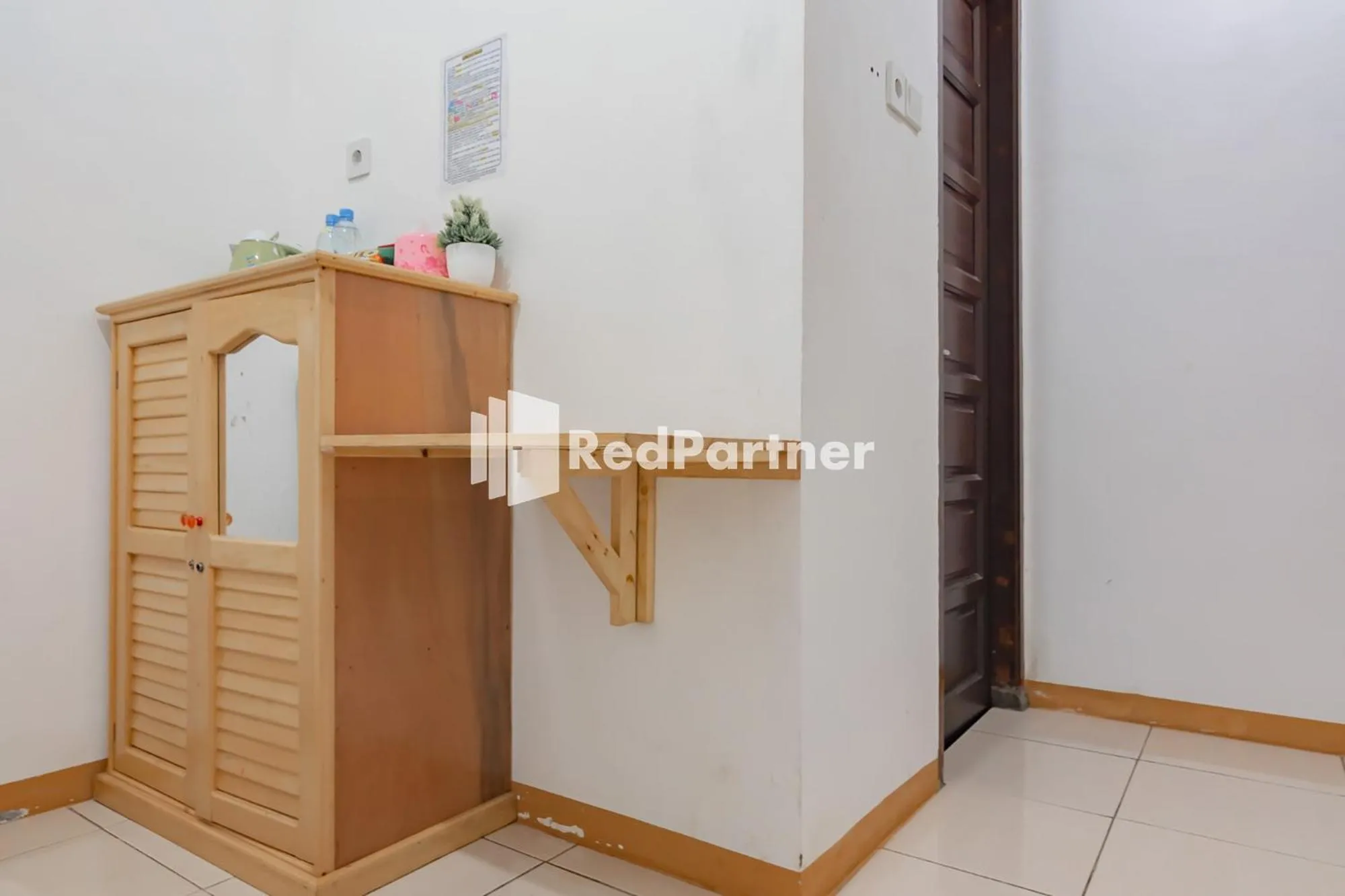 Bedroom in Langkar Guest House Syariah Mitra RedDoorz