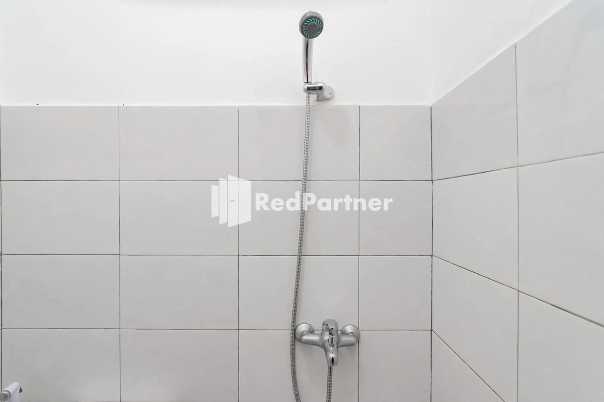 Bathroom in Langkar Guest House Syariah Mitra RedDoorz