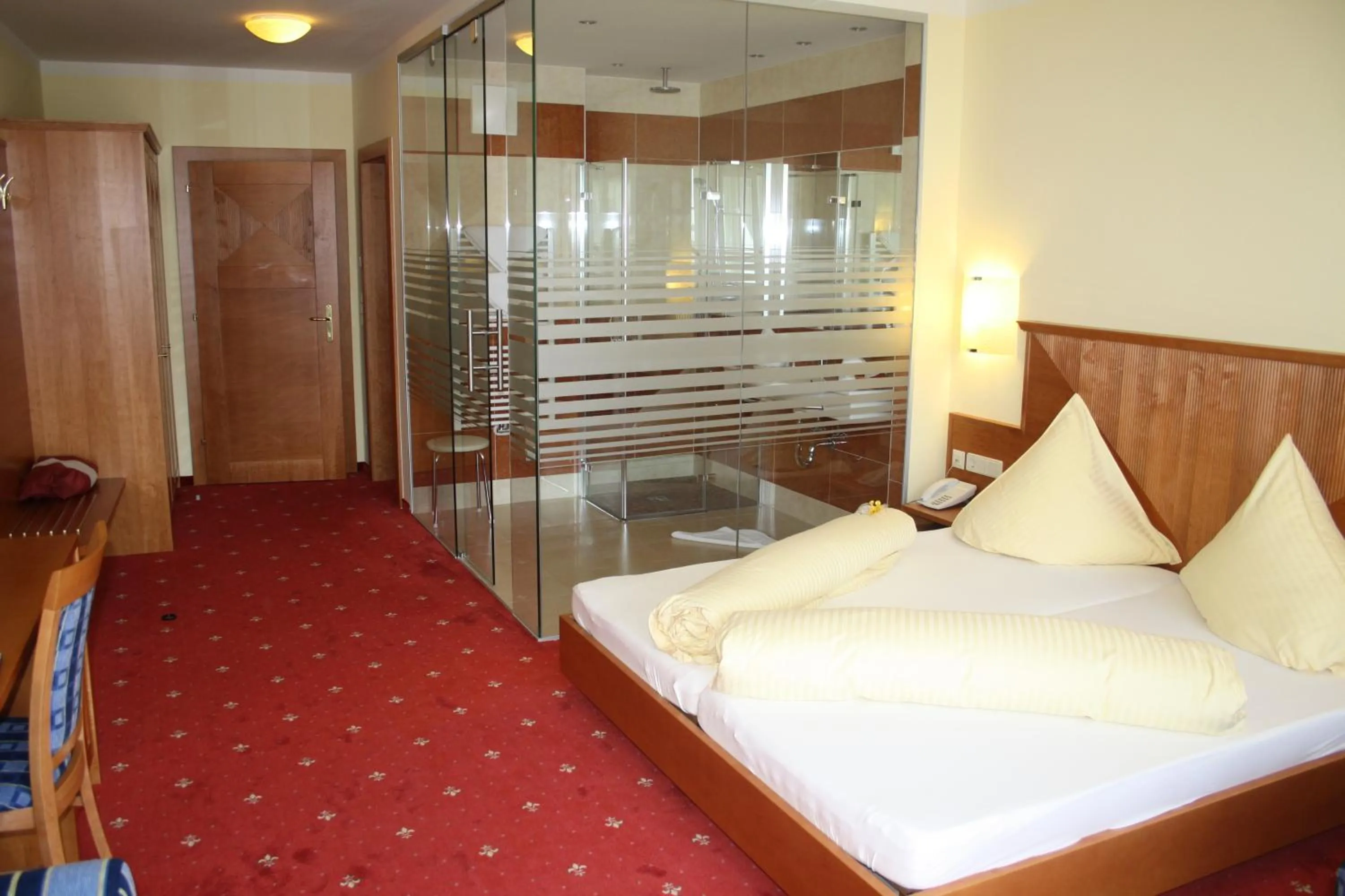 Decorative detail, Bed in Posthotel Radstadt