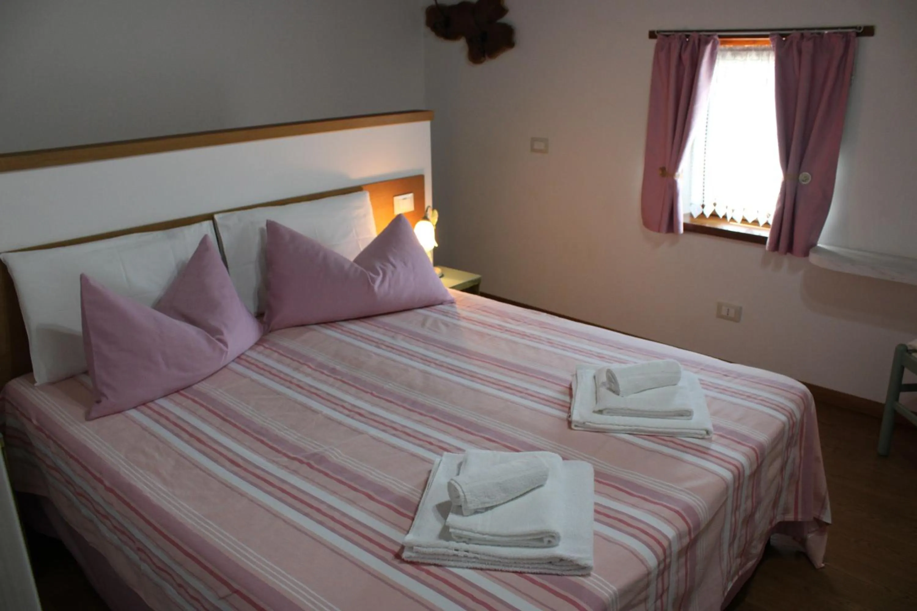 Bed in Giuliva B&B