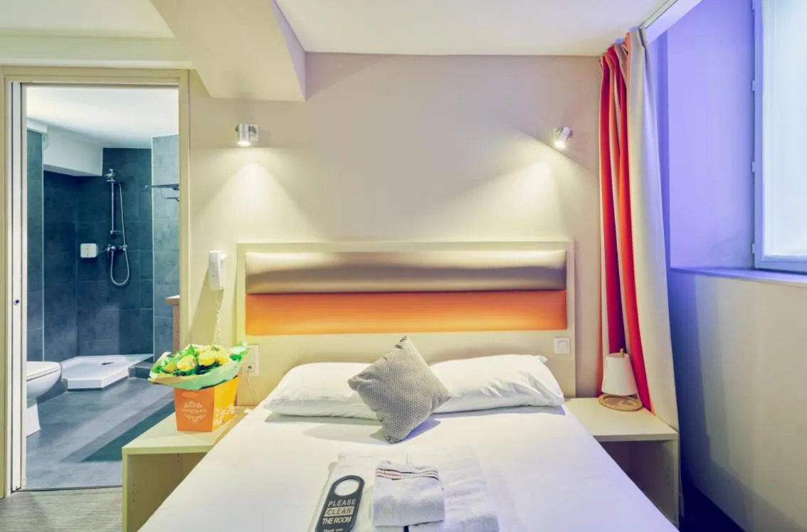 Bed in Adonis Hotel Strasbourg