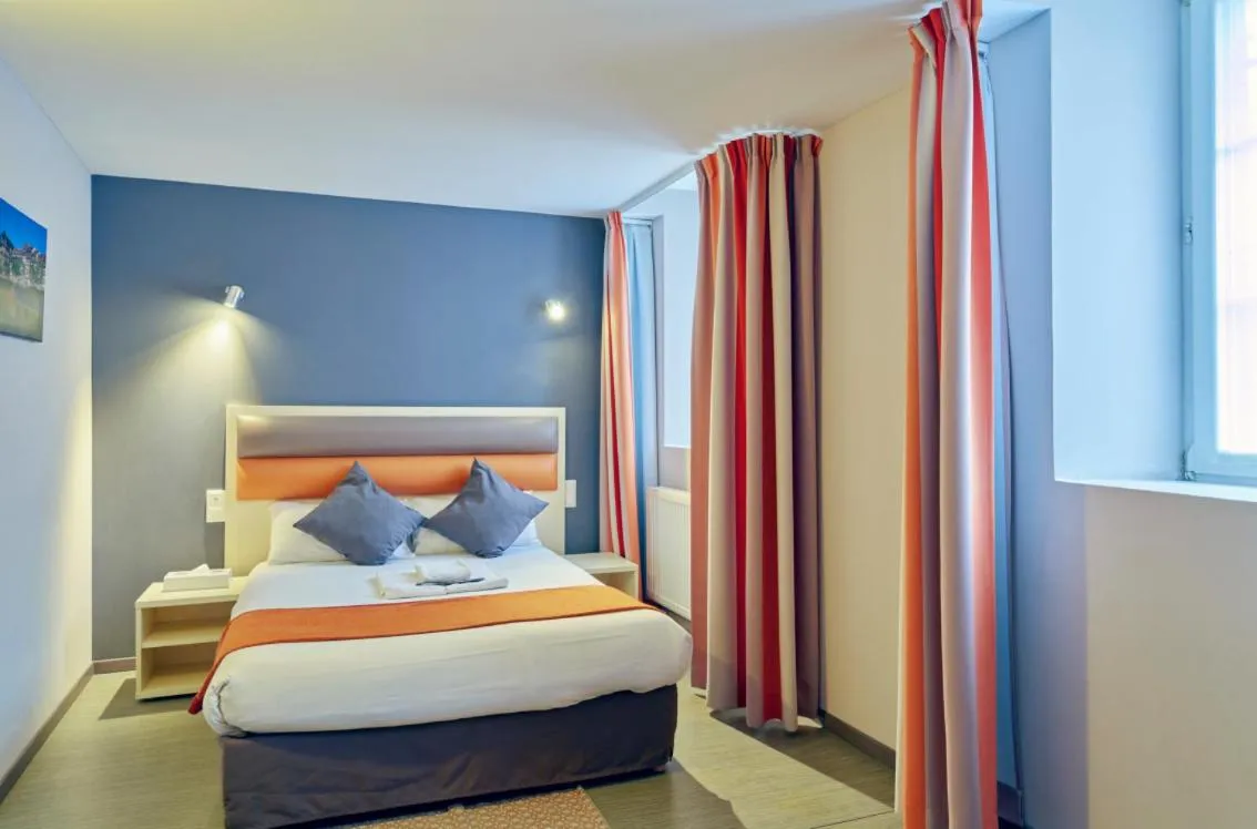 Photo of the whole room, Bed in Adonis Hotel Strasbourg