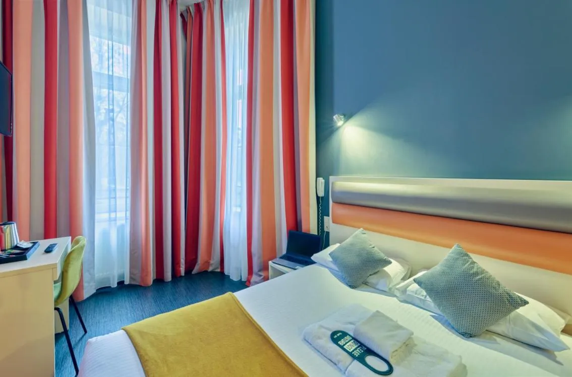 Bed in Adonis Hotel Strasbourg