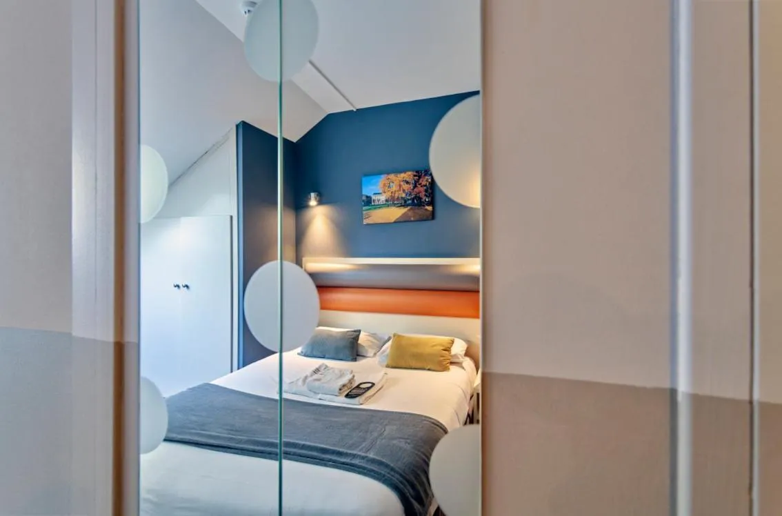 Bed in Adonis Hotel Strasbourg