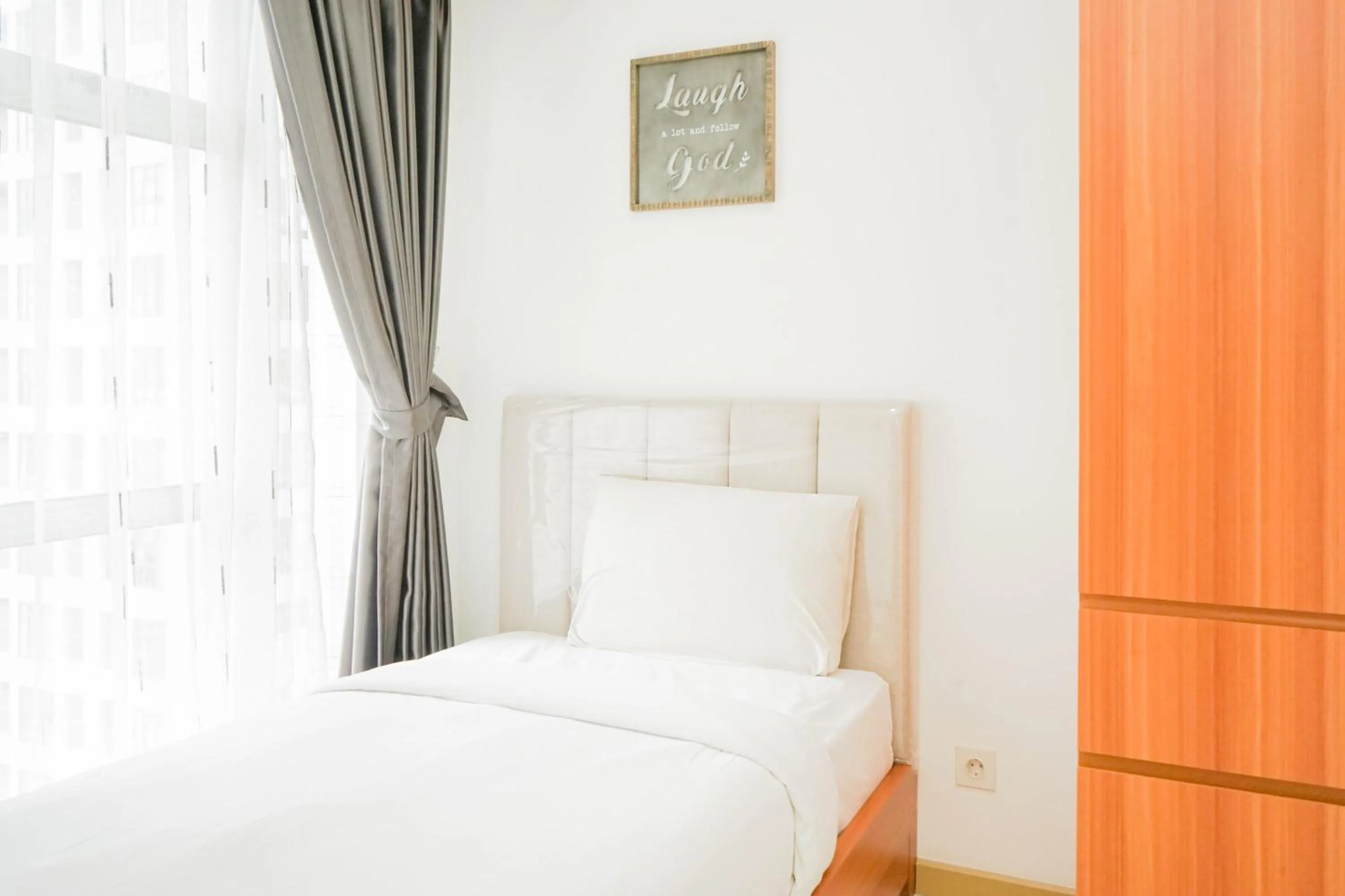 Bedroom in Great Choice 2BR Apartment at M-Town Residence By Travelio