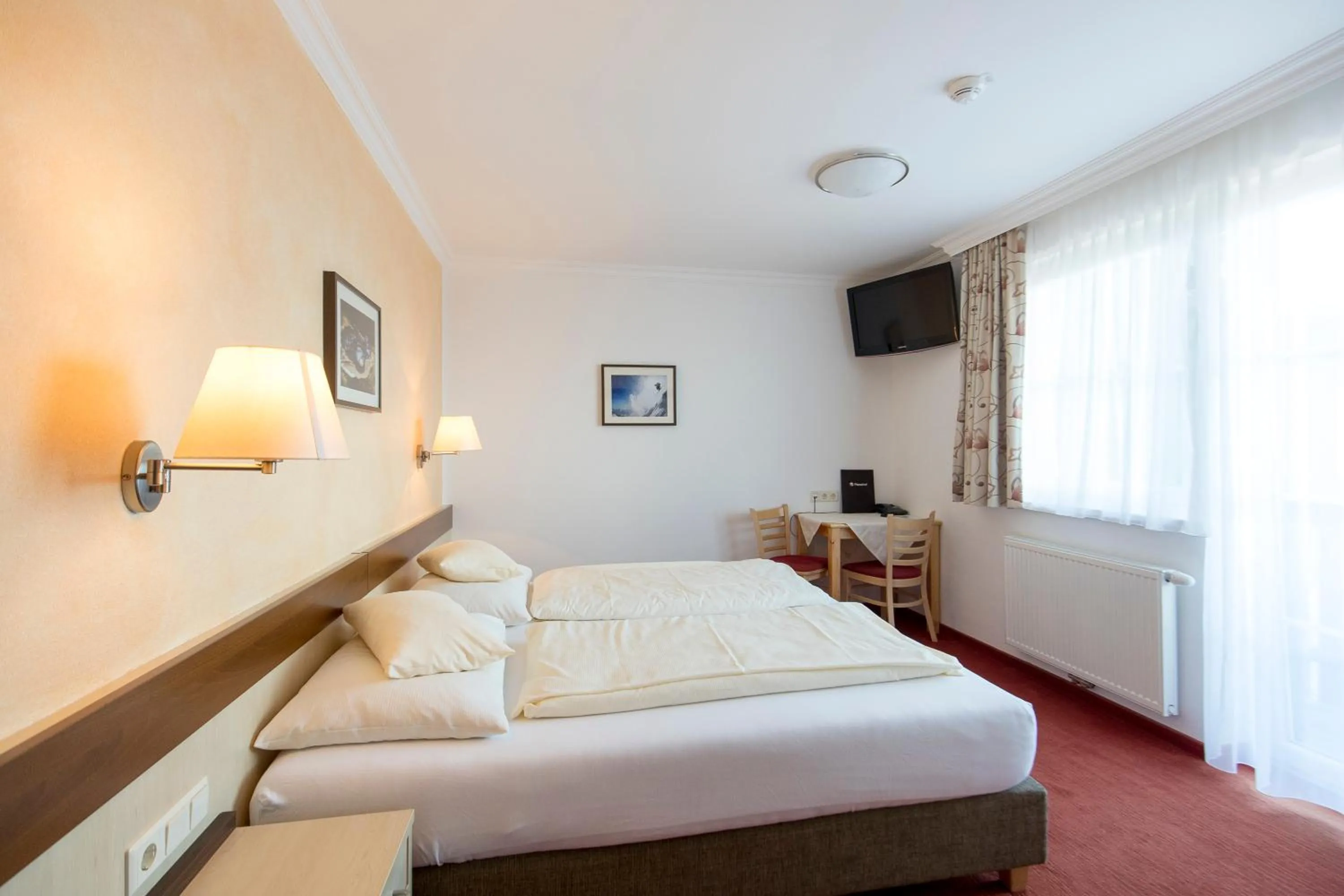 Photo of the whole room, Bed in Hotel-Restaurant Planaihof