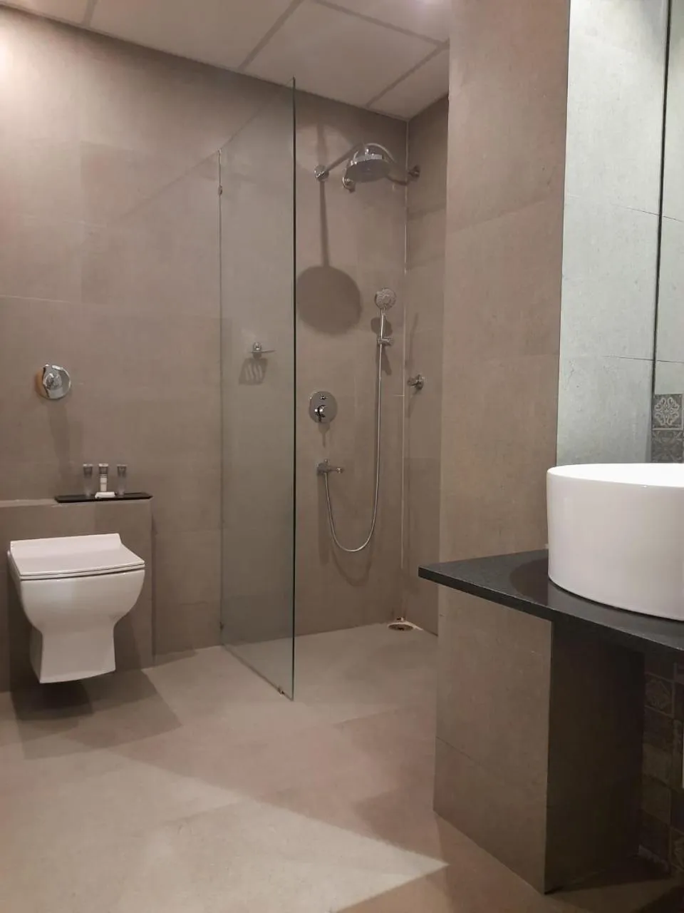 Shower in Regenta INN Grand Koramangala by Royal Orchid Hotels