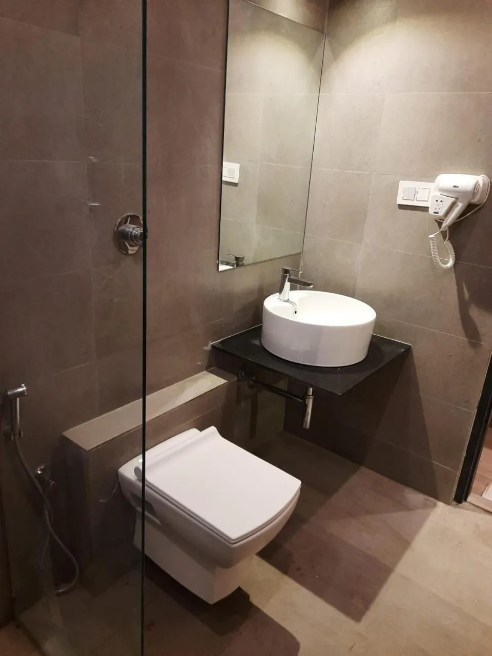 Bathroom in Regenta INN Grand Koramangala by Royal Orchid Hotels