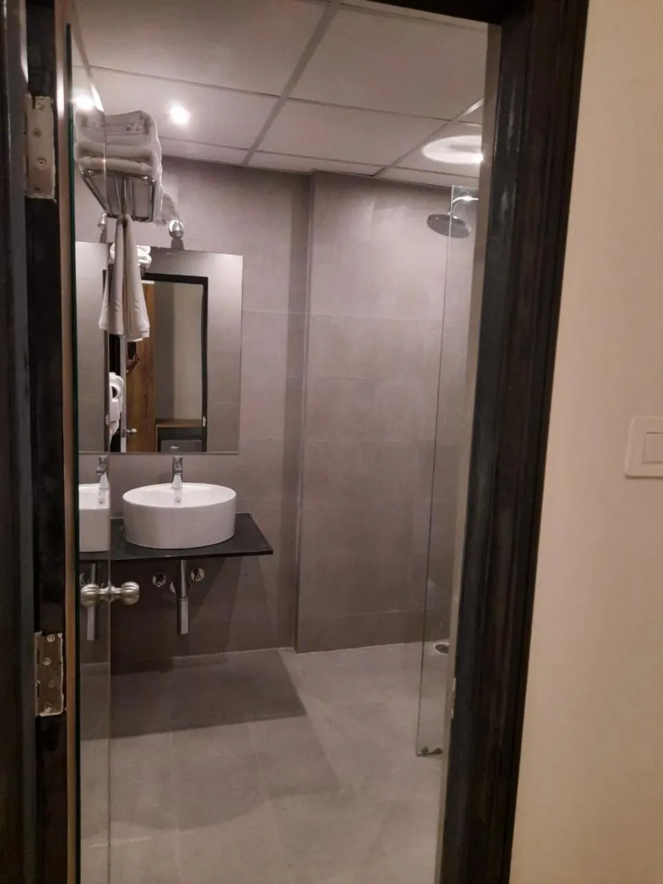 Bathroom in Regenta INN Grand Koramangala by Royal Orchid Hotels