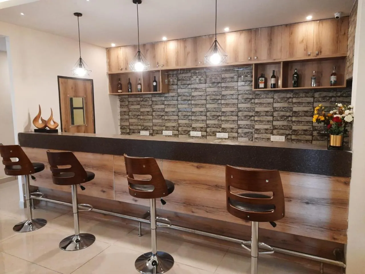 Seating area in Regenta INN Grand Koramangala by Royal Orchid Hotels