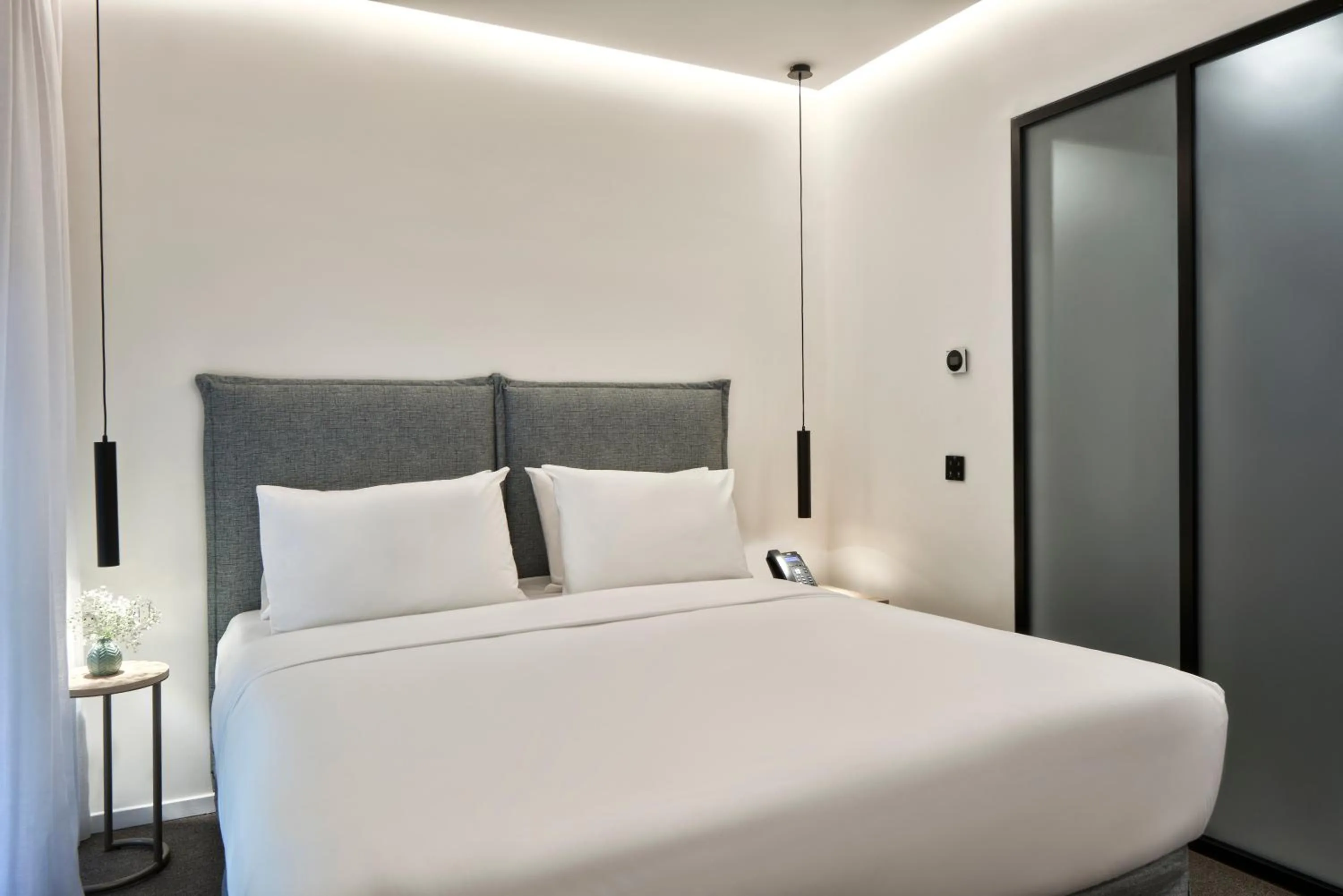 Bed in NLH MONASTIRAKI - Neighborhood Lifestyle Hotels