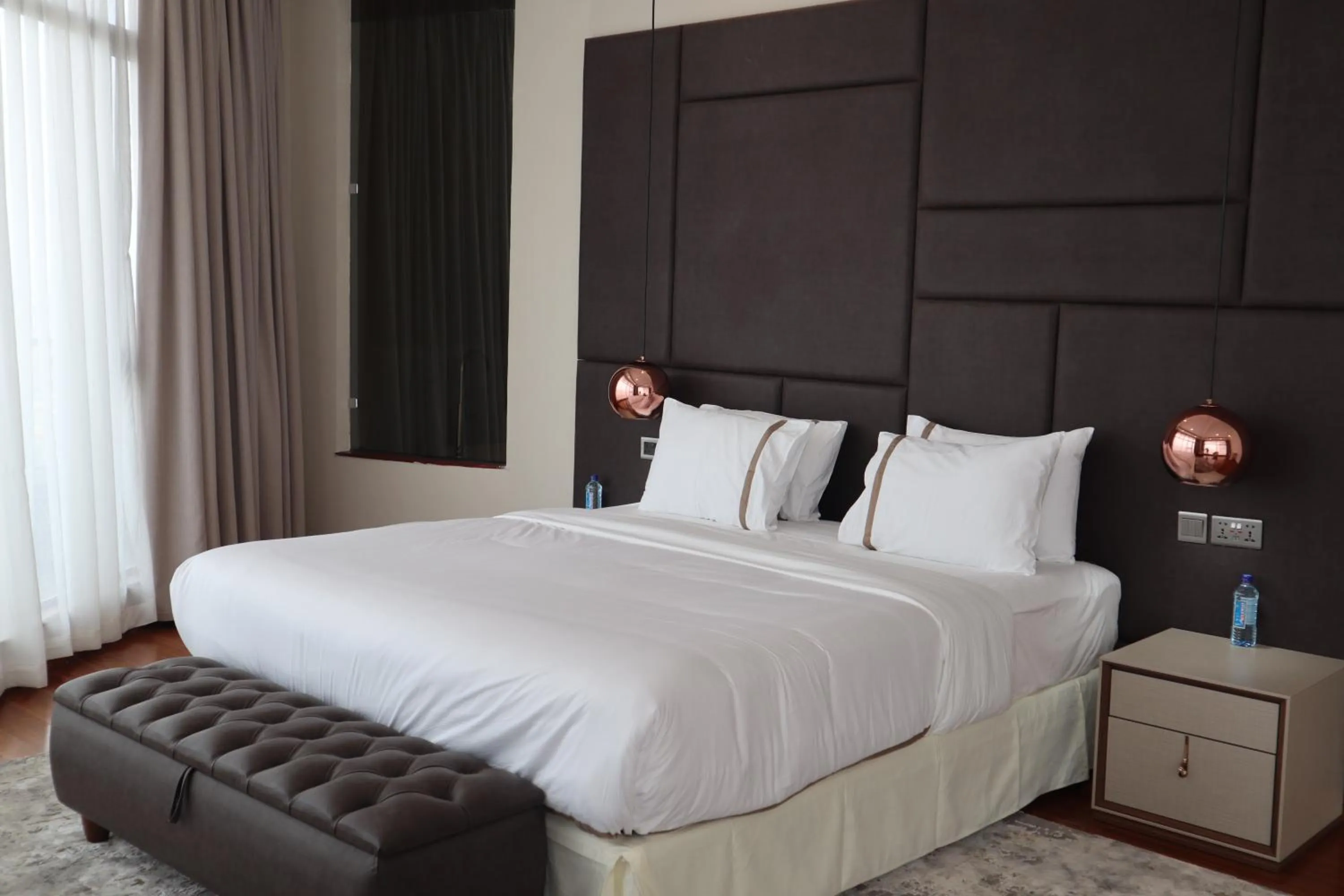 Bed in The Curve by the Park Apartments