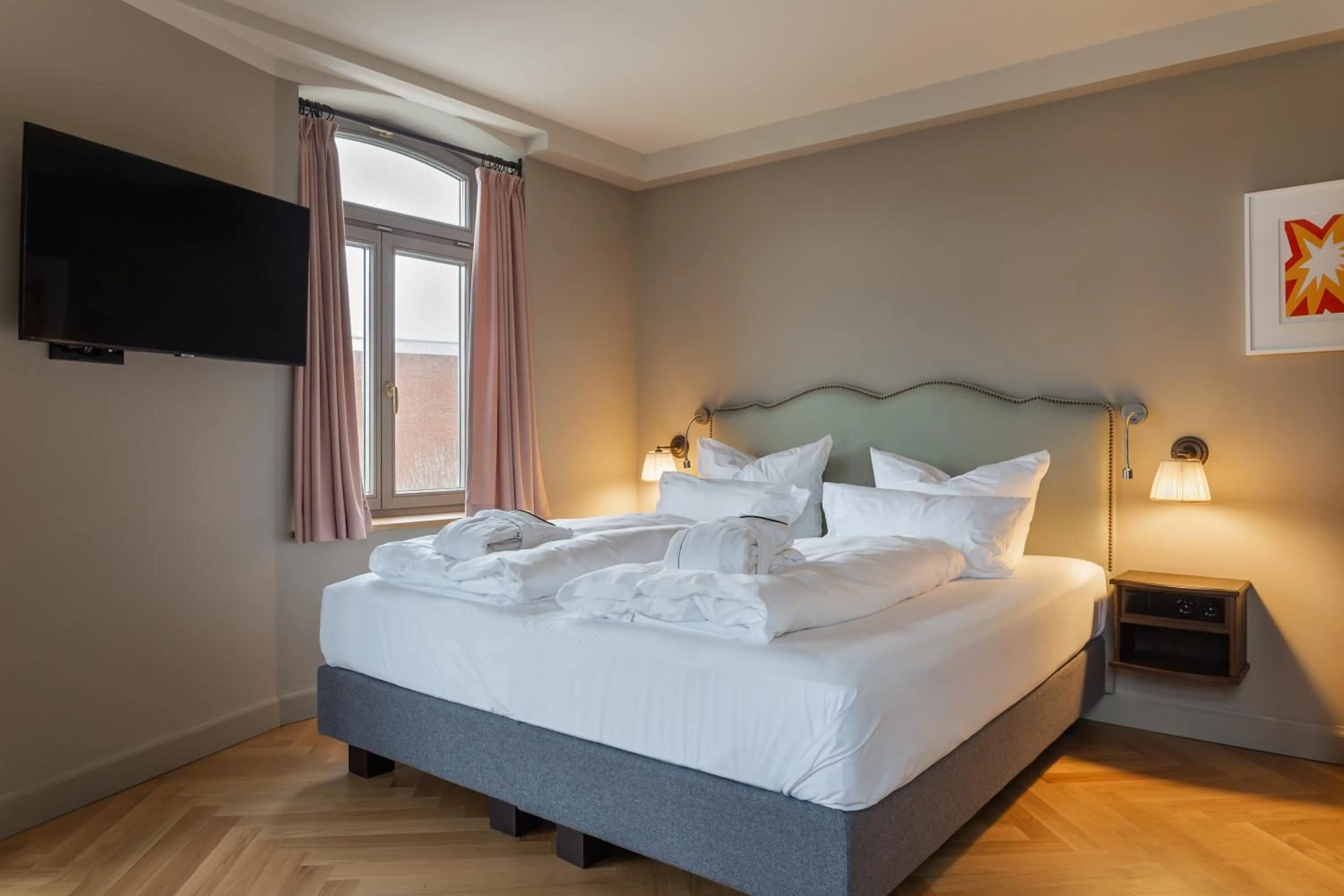 Bed in Mimosa Suites