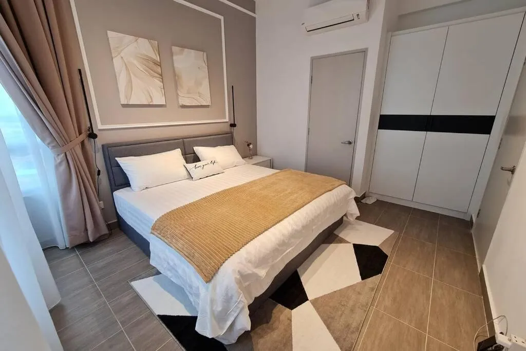 Bed in Mizrai Troika Homestay with Kota Bharu city view