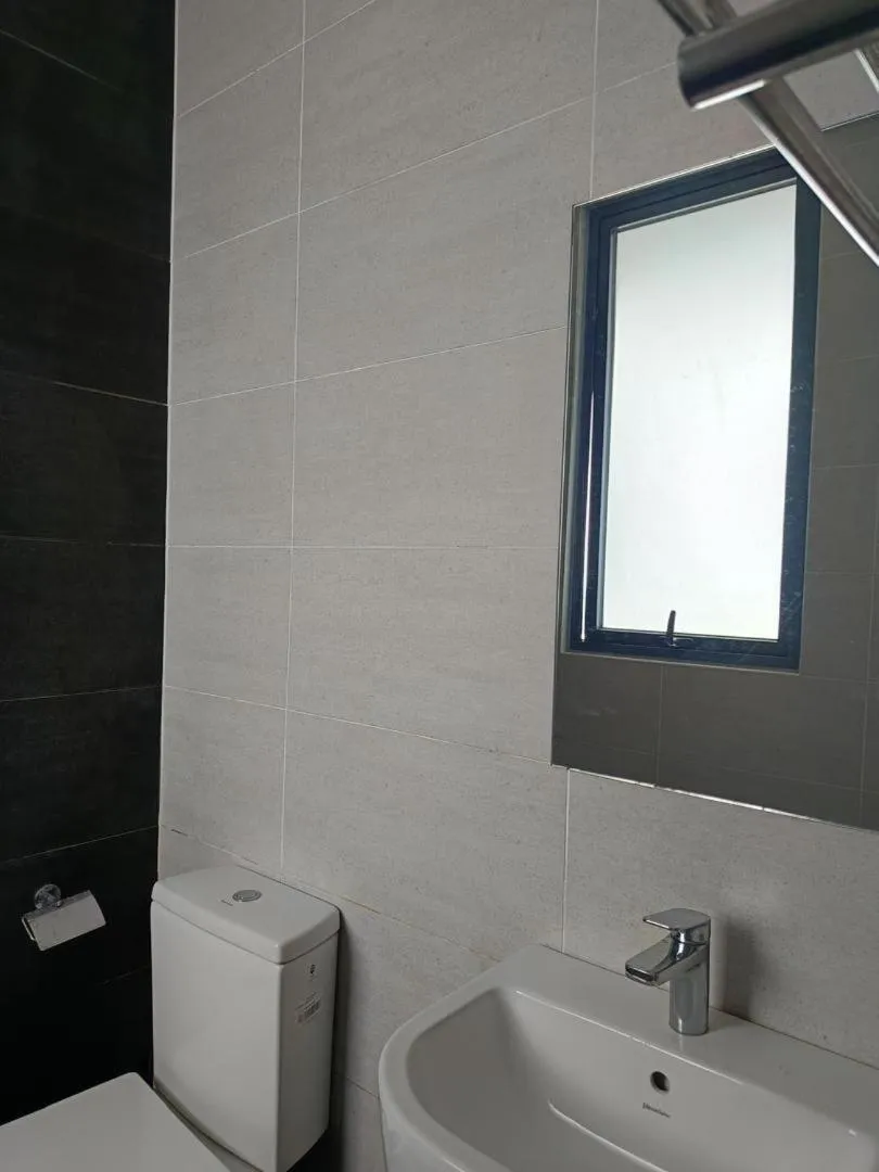 Bathroom in Mizrai Troika Homestay with Kota Bharu city view