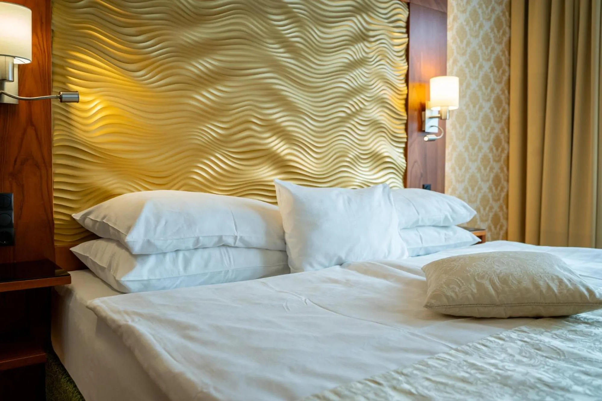 Bed in Hotel Josefshof am Rathaus