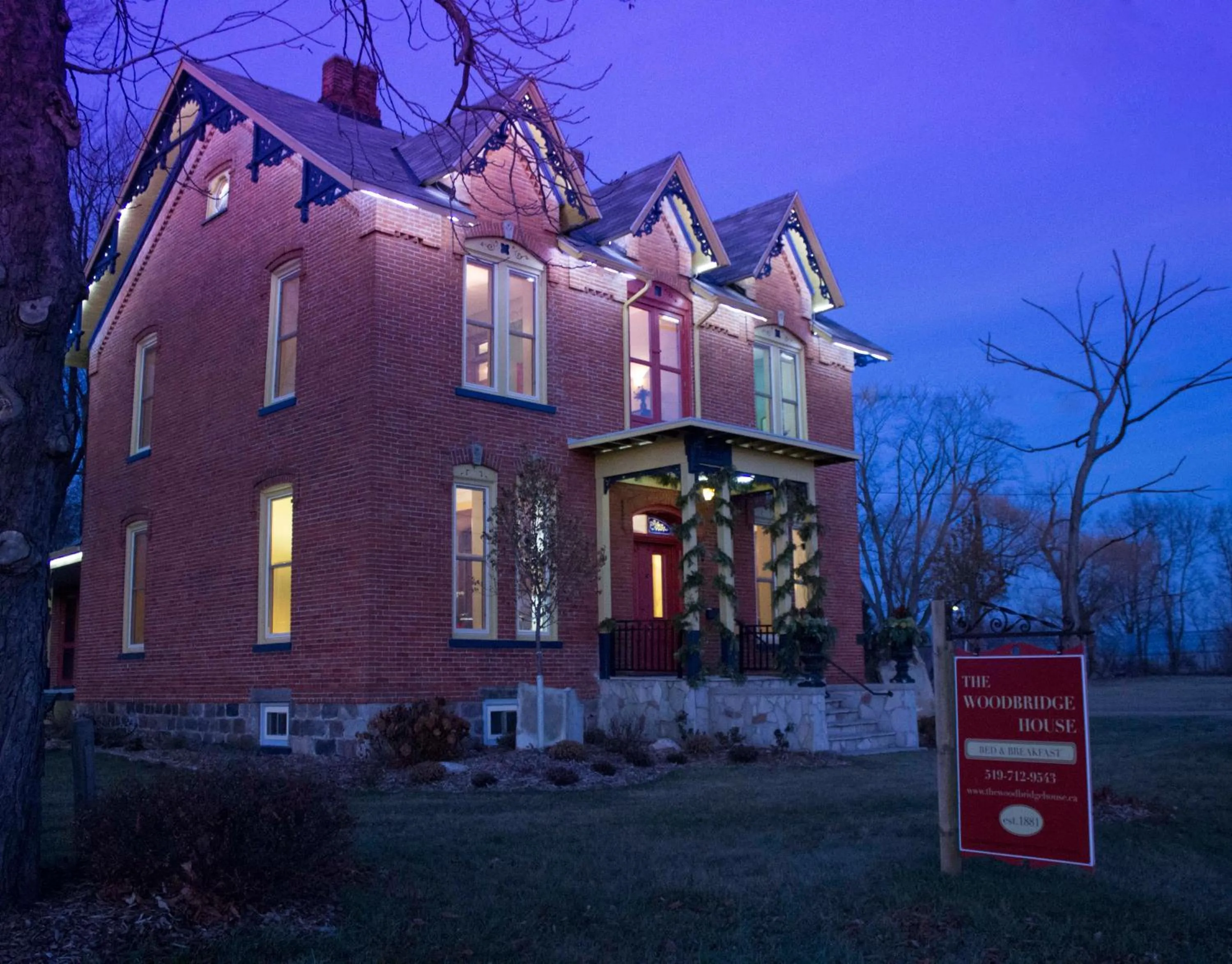 Property logo or sign in The Woodbridge House