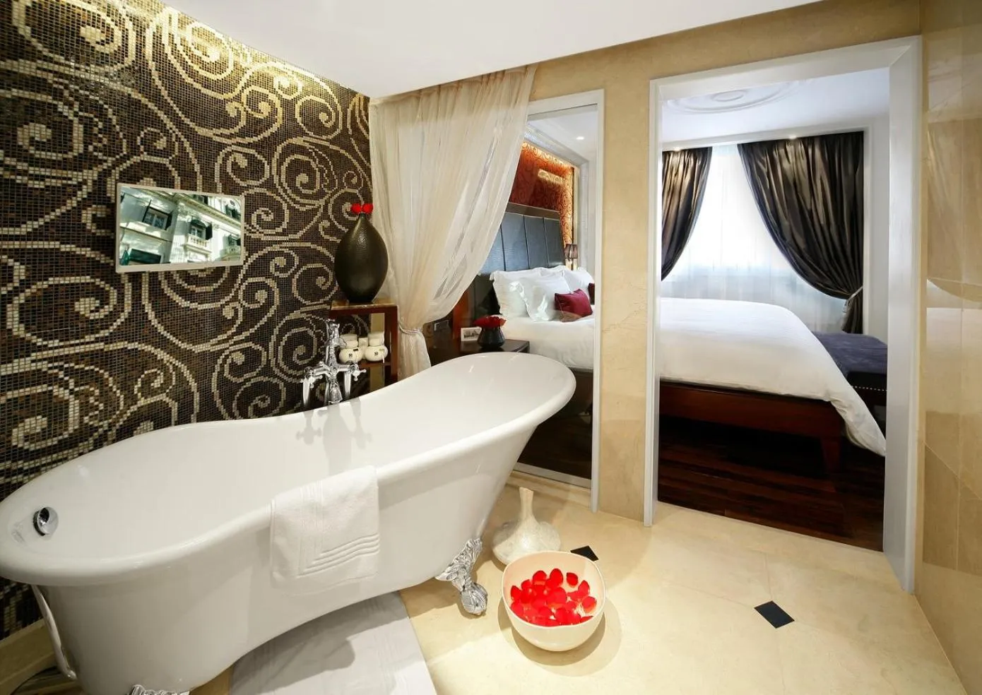 Bathroom, Bed in Sofitel Legend Metropole Hanoi