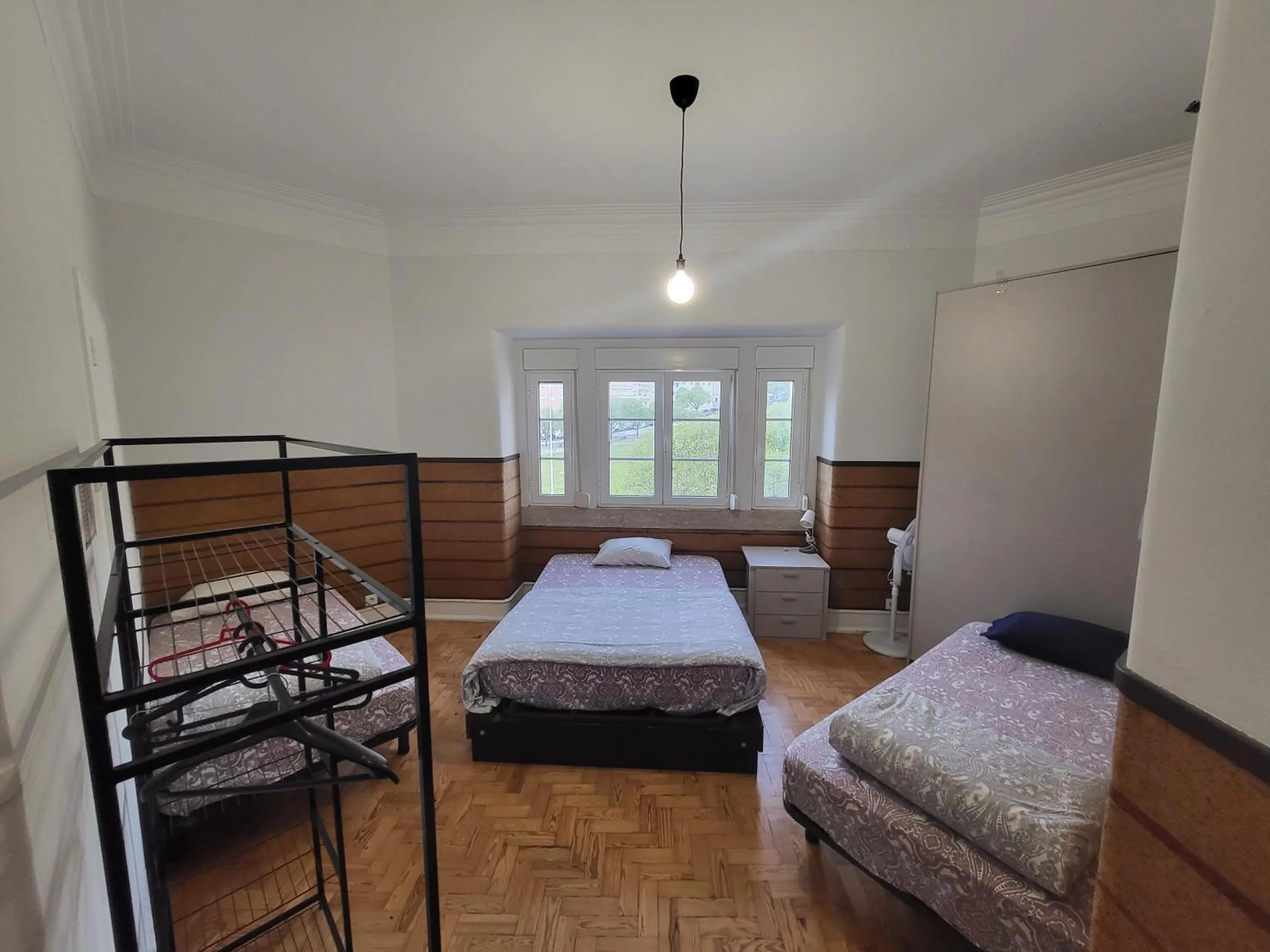 Bed in Rainbow Guest House