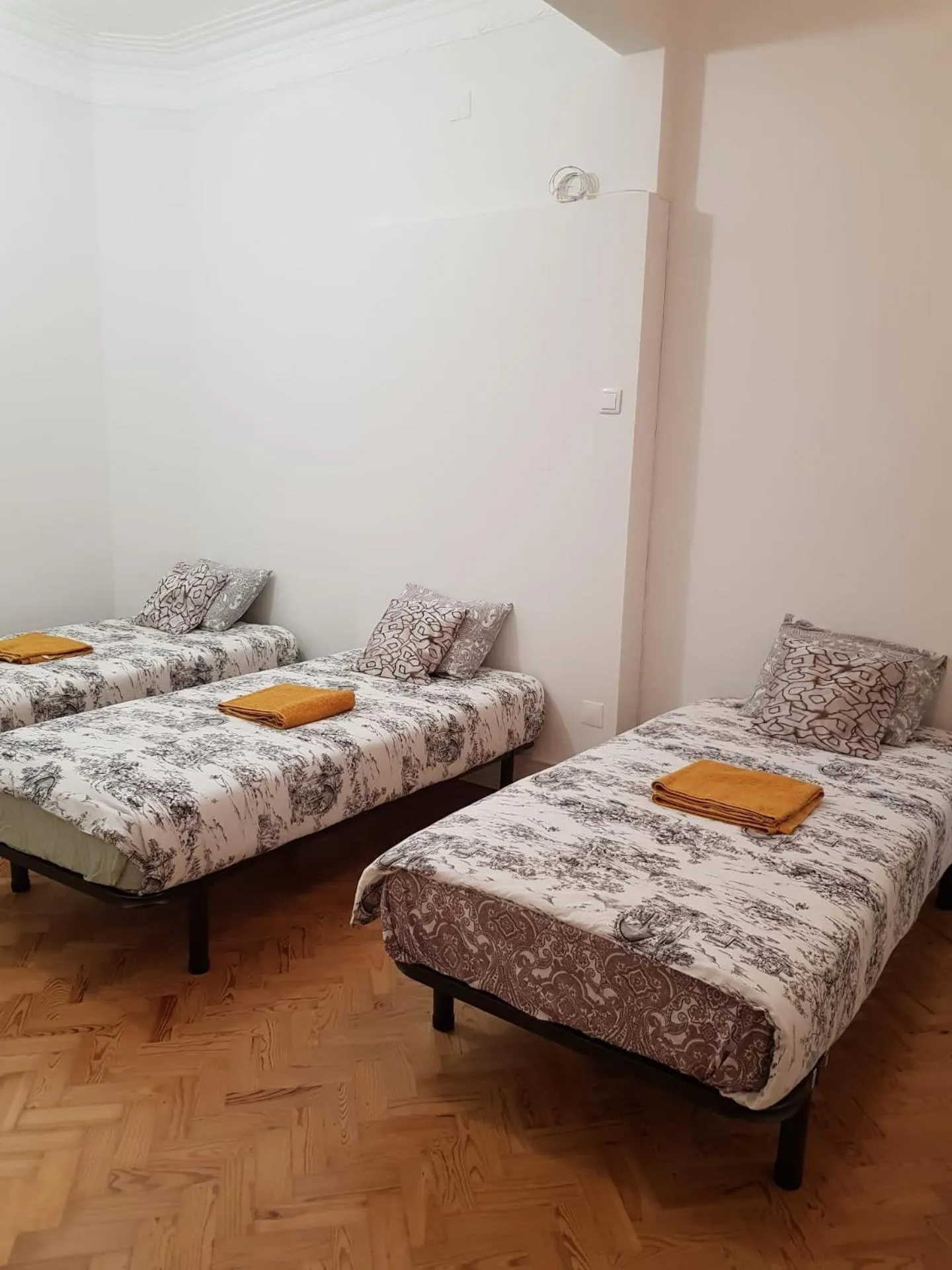 Bed in Rainbow Guest House