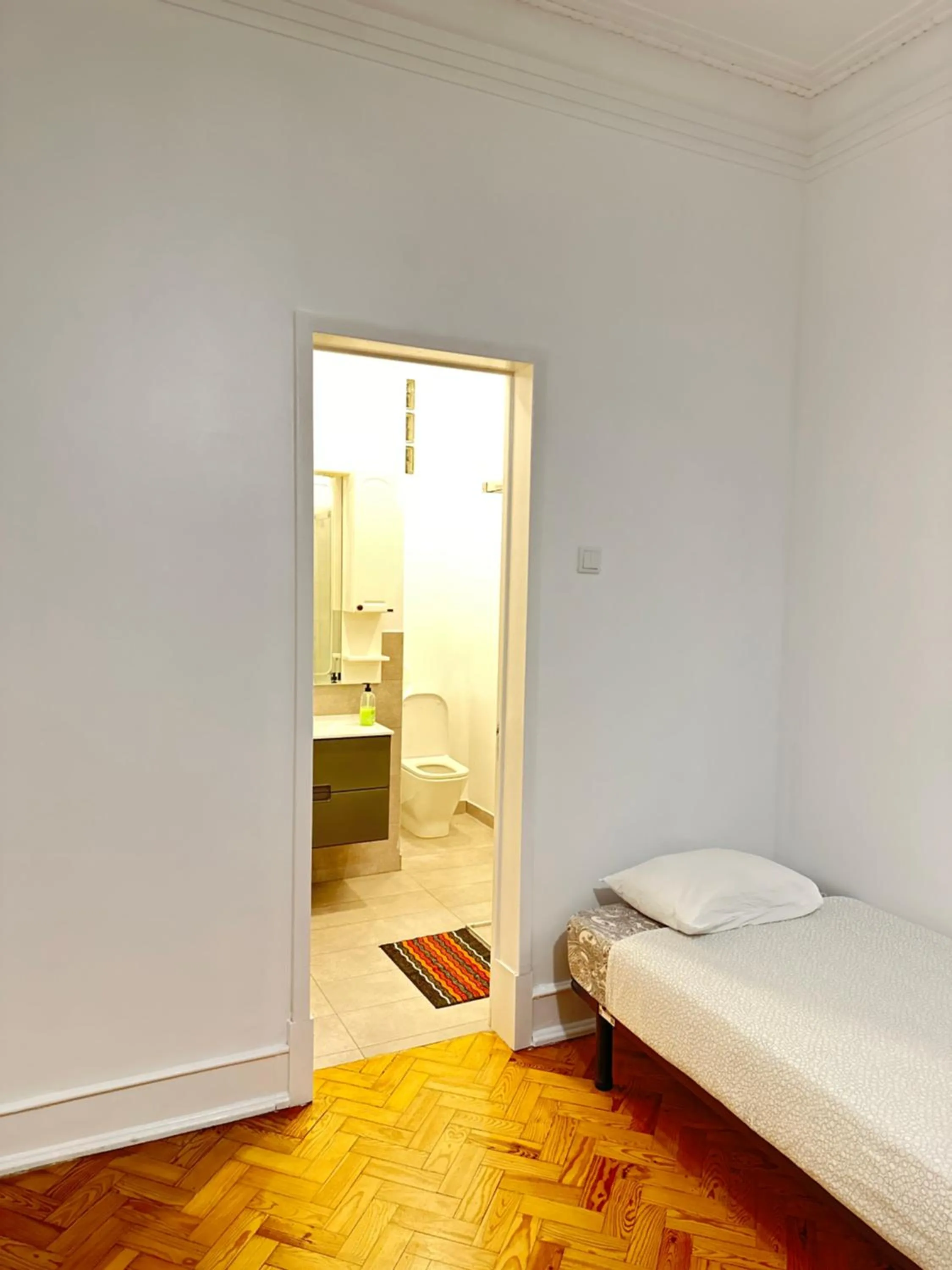 Bed in Rainbow Guest House