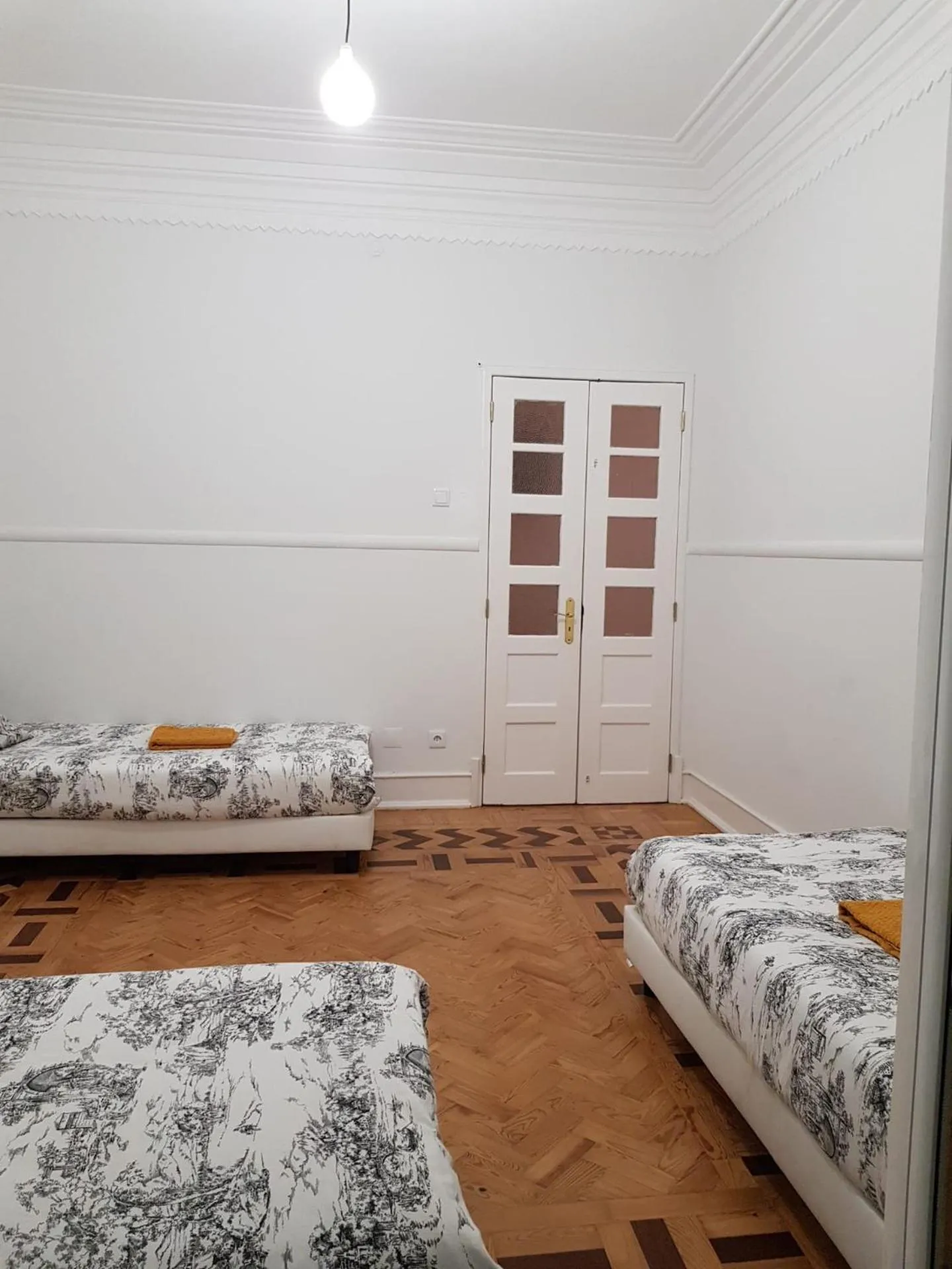 Bed in Rainbow Guest House