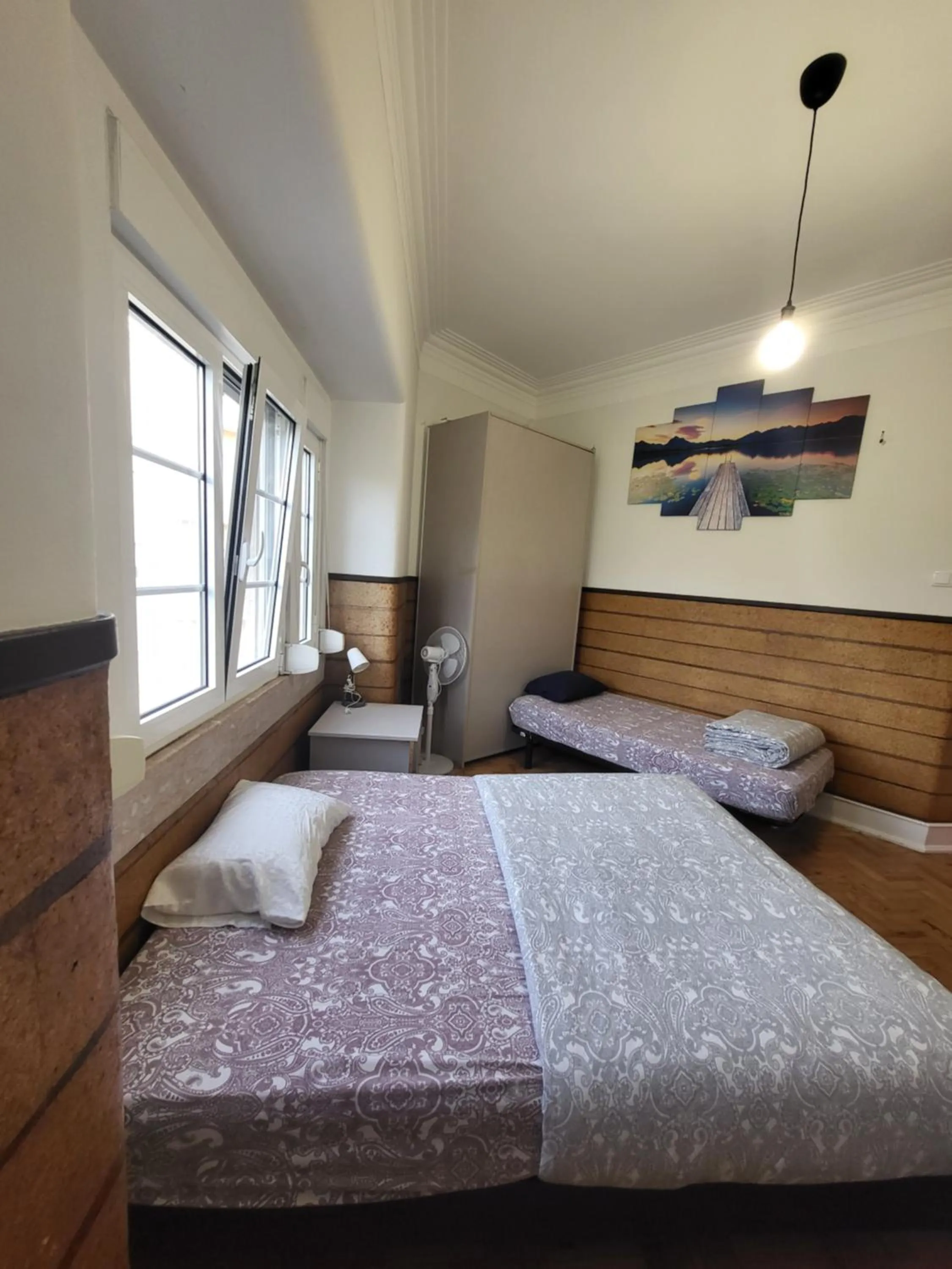 Bed in Rainbow Guest House