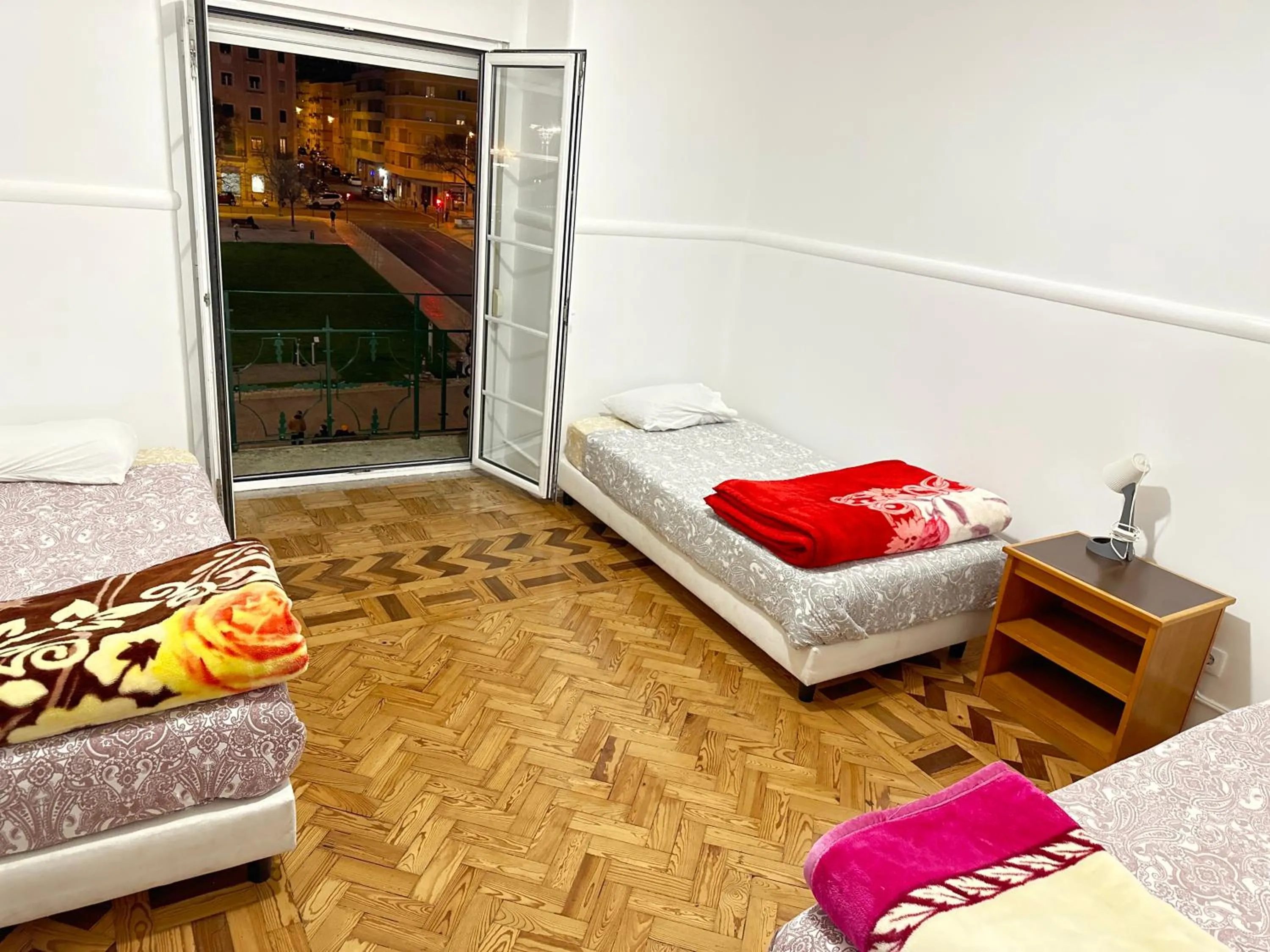 Bed in Rainbow Guest House