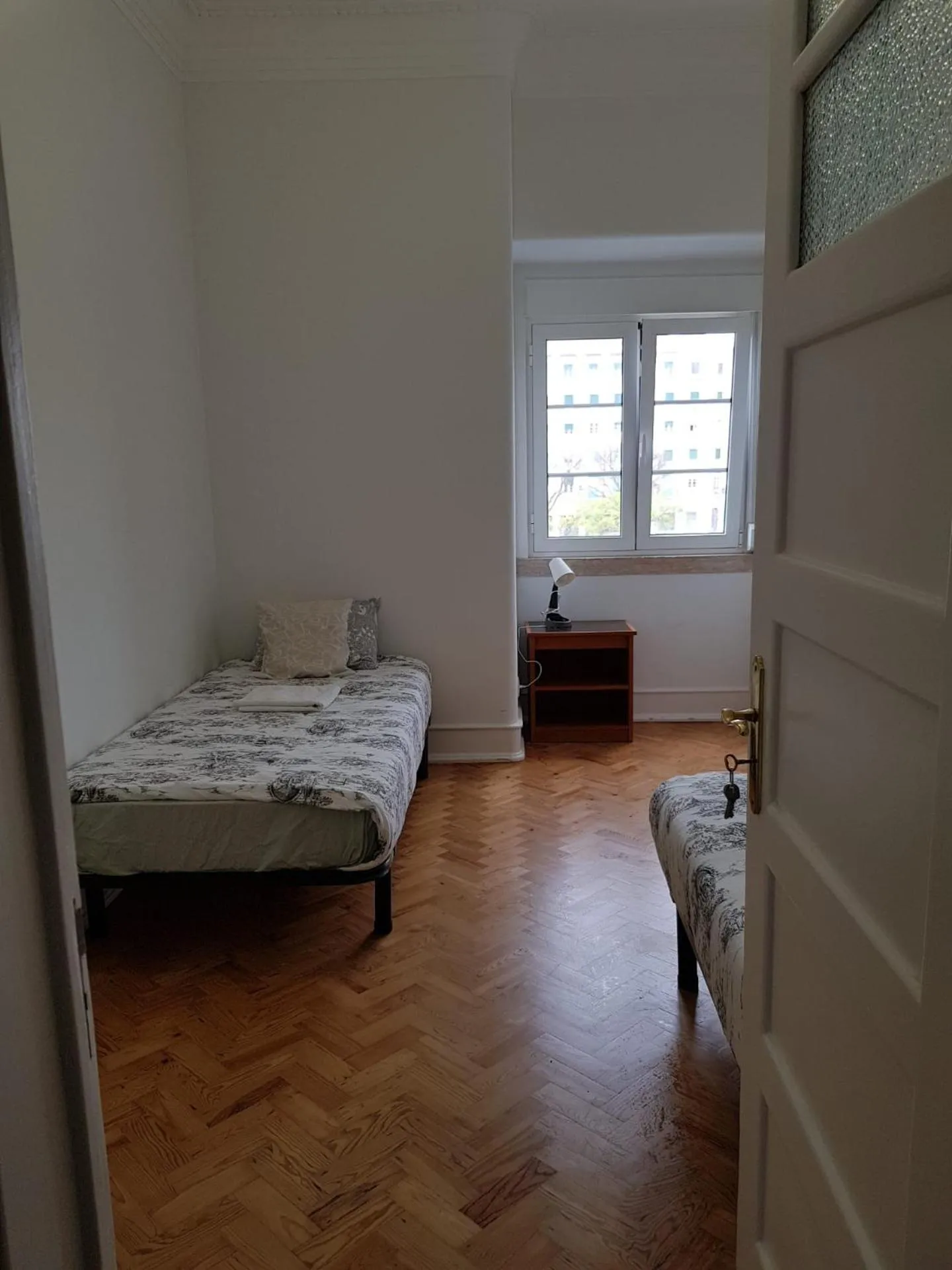 Bed in Rainbow Guest House