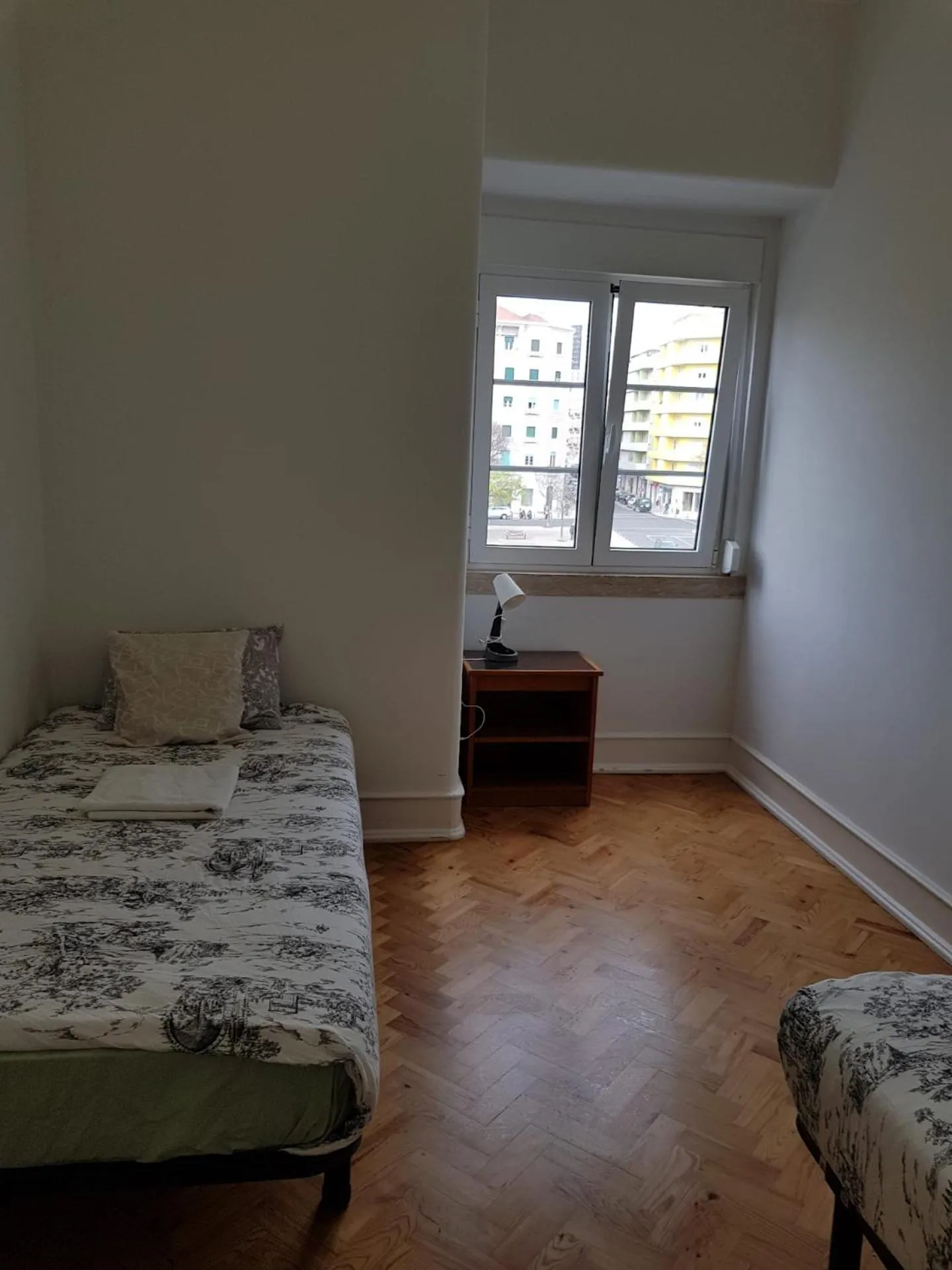 Bed in Rainbow Guest House