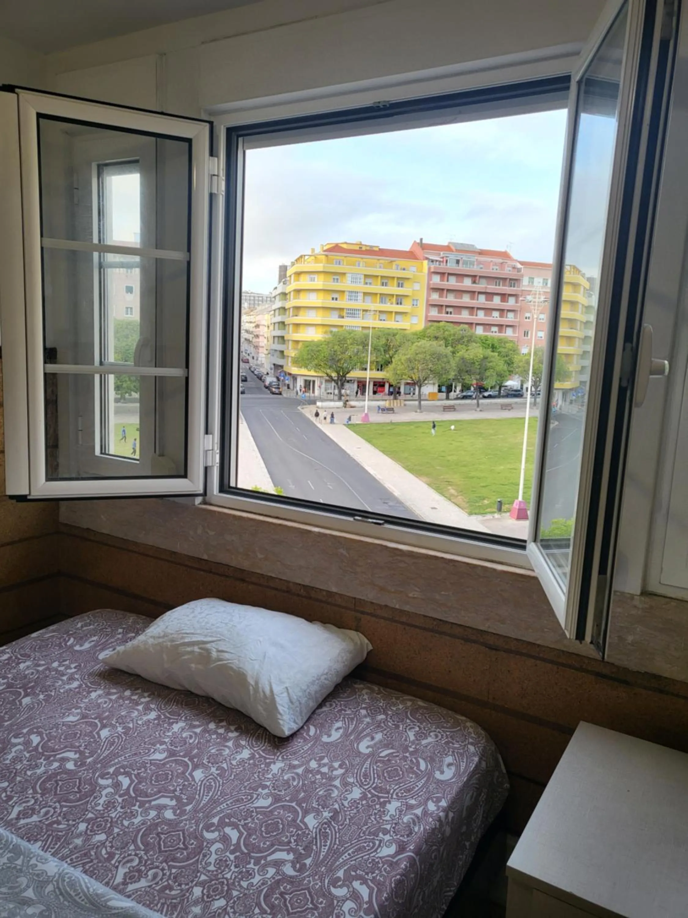 Bed in Rainbow Guest House