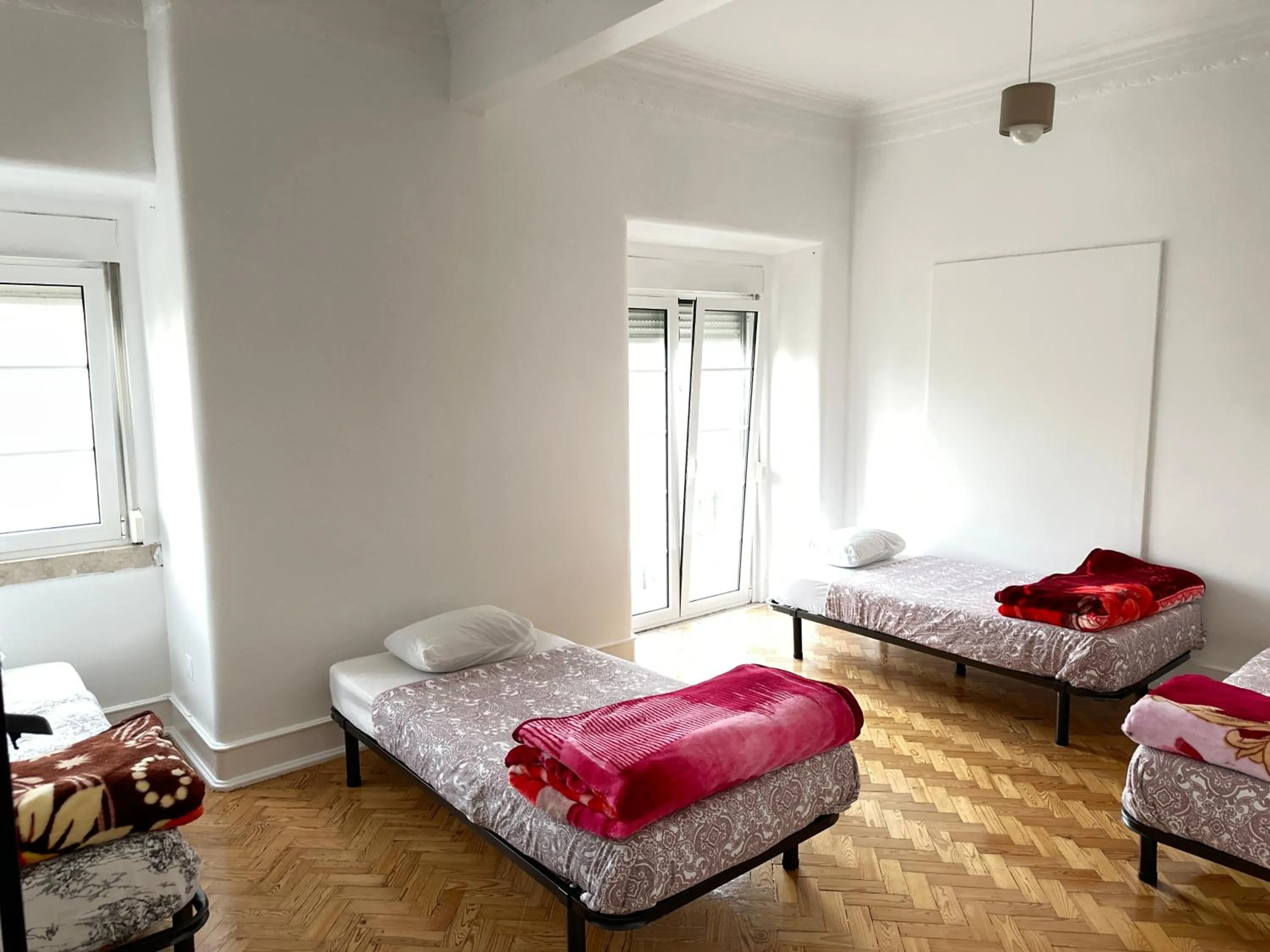 Bed in Rainbow Guest House