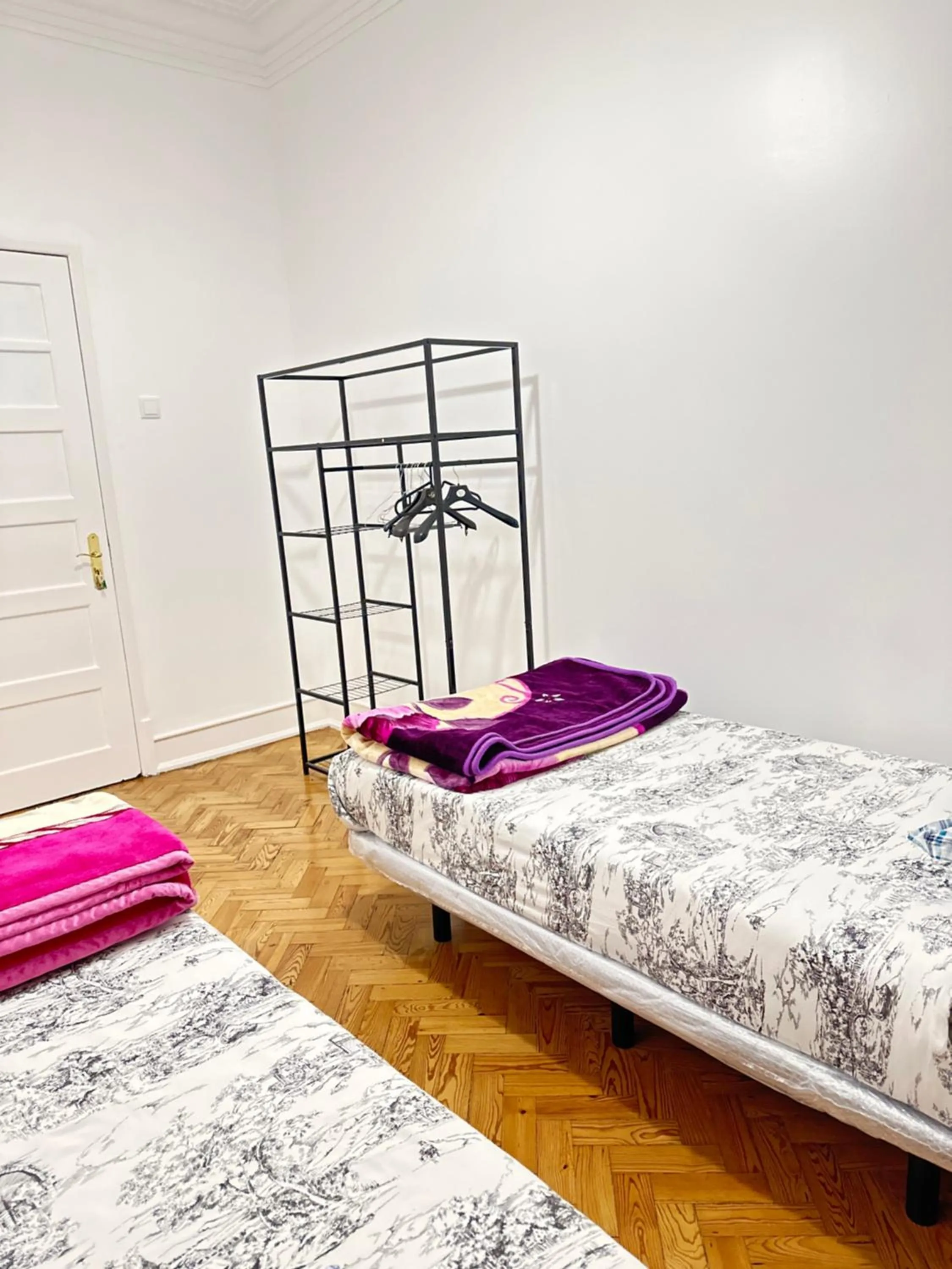 Bed in Rainbow Guest House