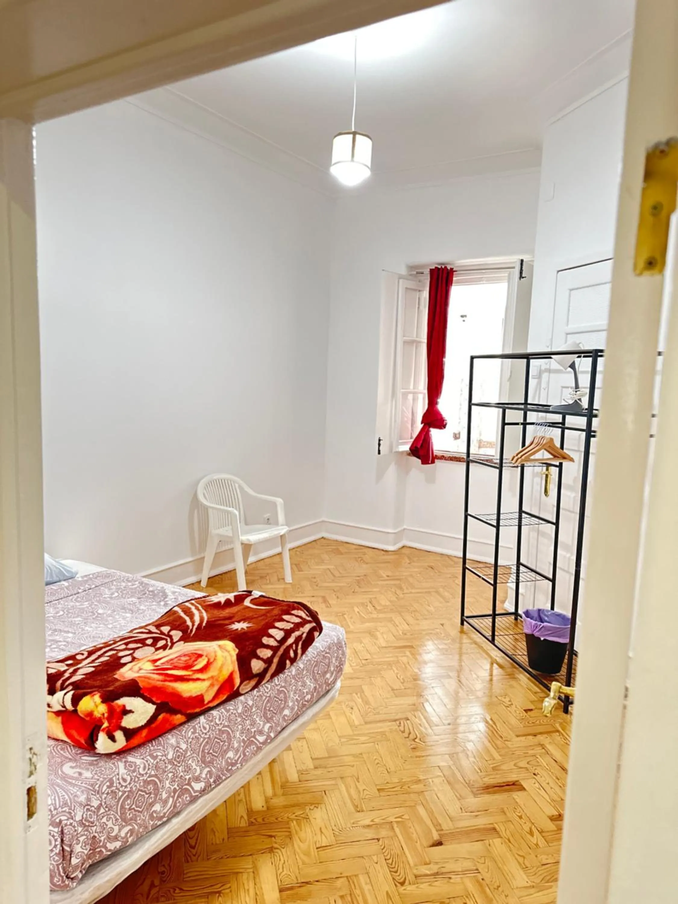 Bed in Rainbow Guest House