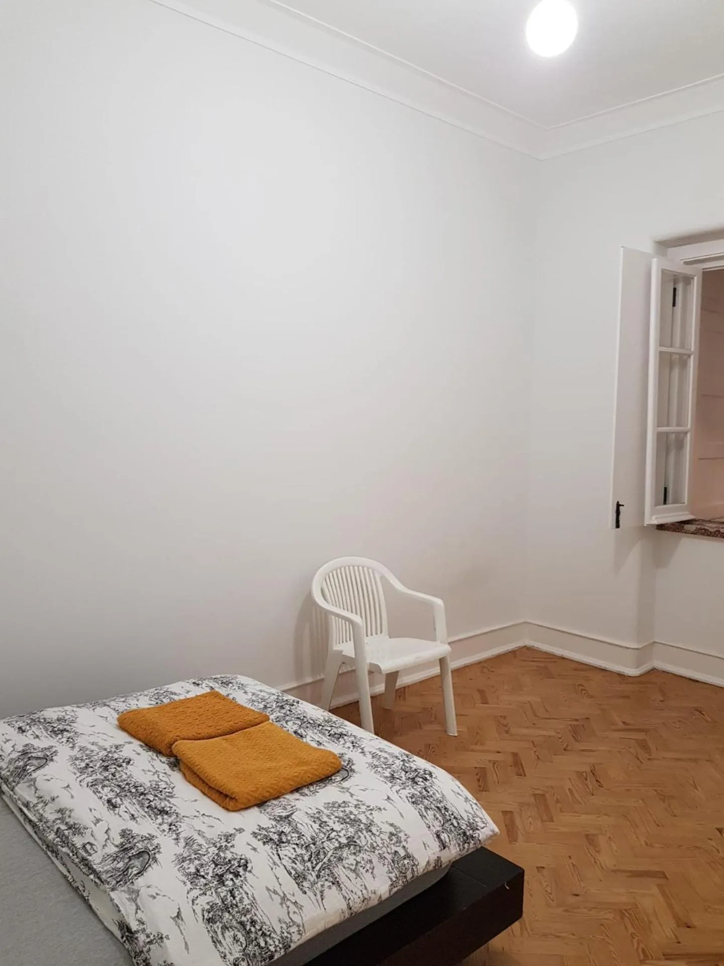 Bed in Rainbow Guest House