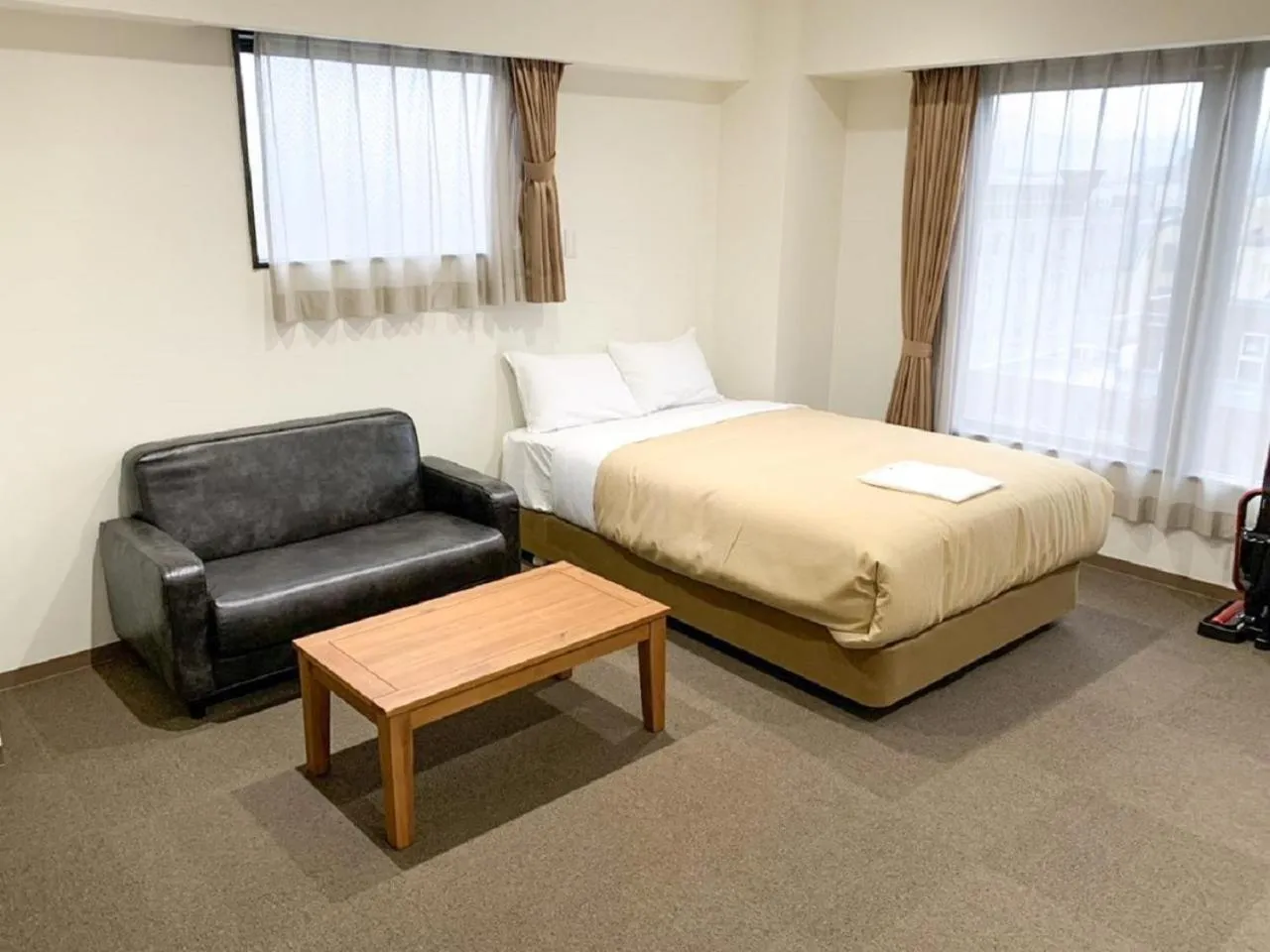 Bed in HOTEL LiVEMAX Kyoto Nijojonishi