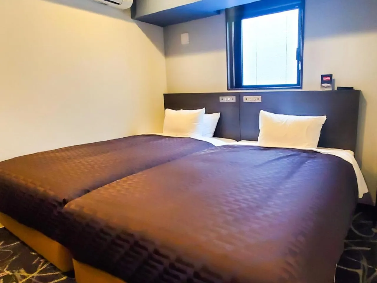 Bed in HOTEL LiVEMAX Yokohama Stadium Mae