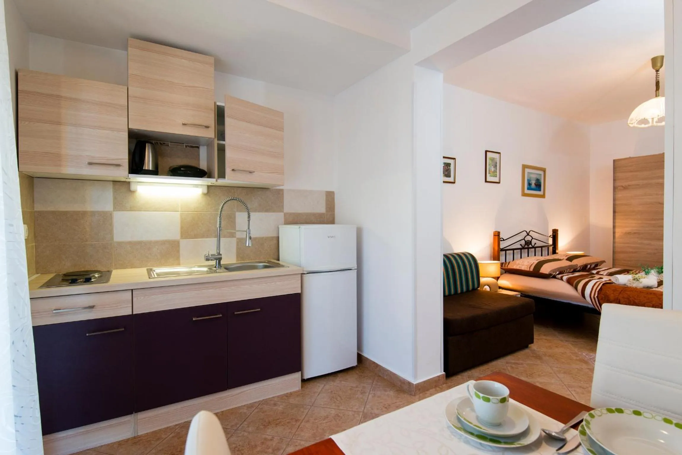 Kitchen or kitchenette, Bed in Apartments Villa Nona
