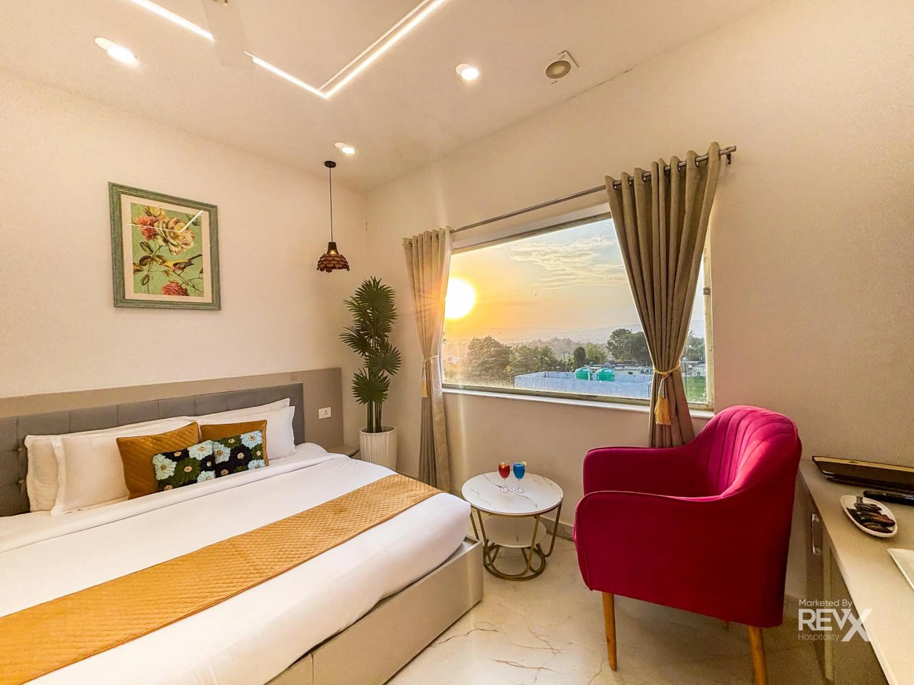 Bed in The Neeraj River Forest Resort Ayurvedic Wellness Center