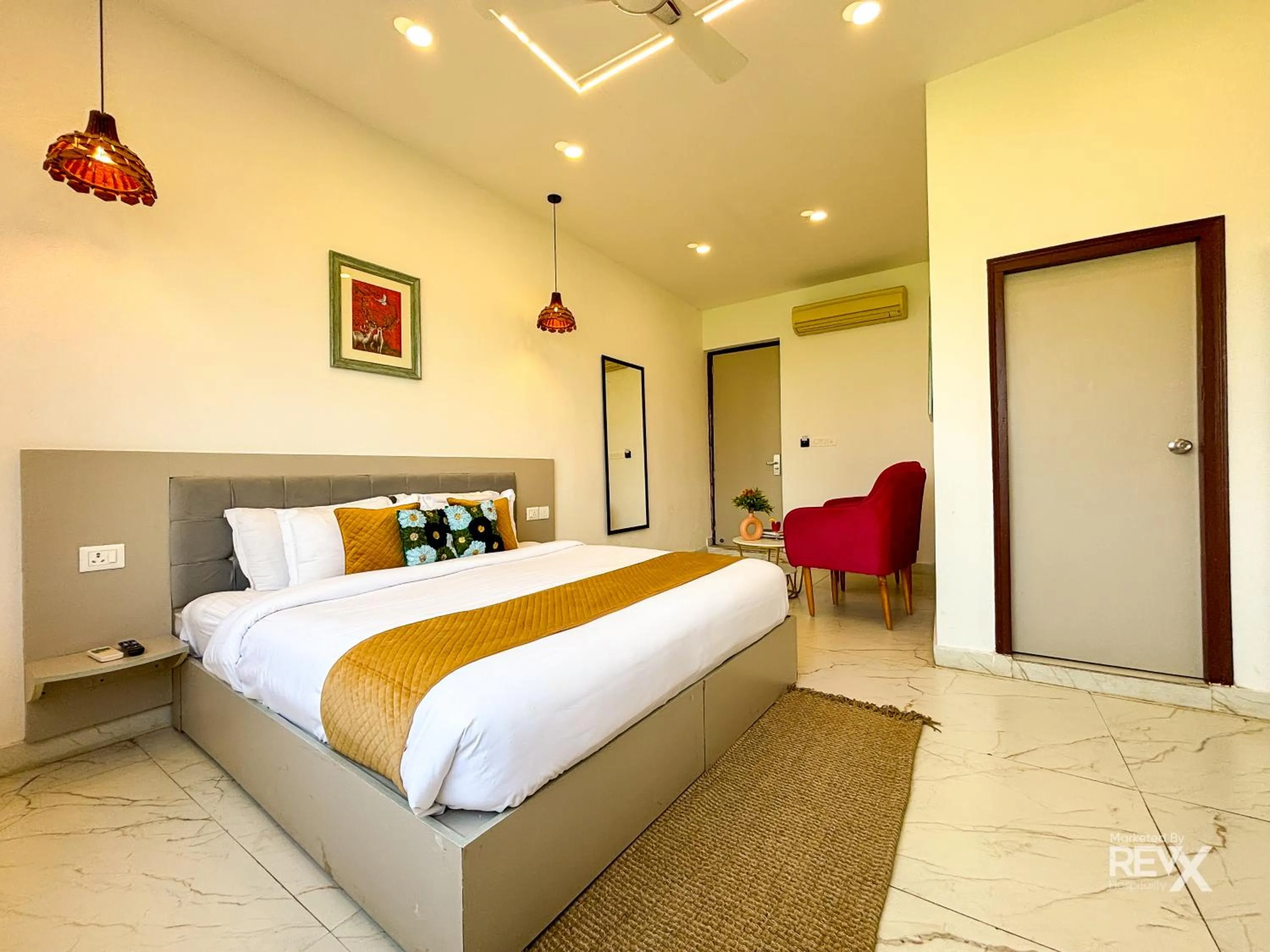 Bed in The Neeraj River Forest Resort Ayurvedic Wellness Center