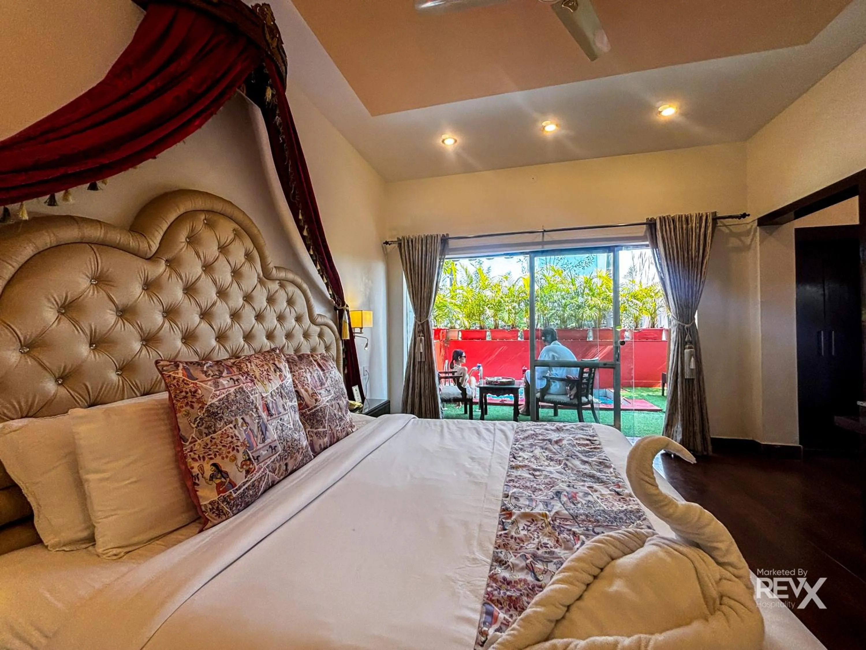 Bed in The Neeraj River Forest Resort Ayurvedic Wellness Center