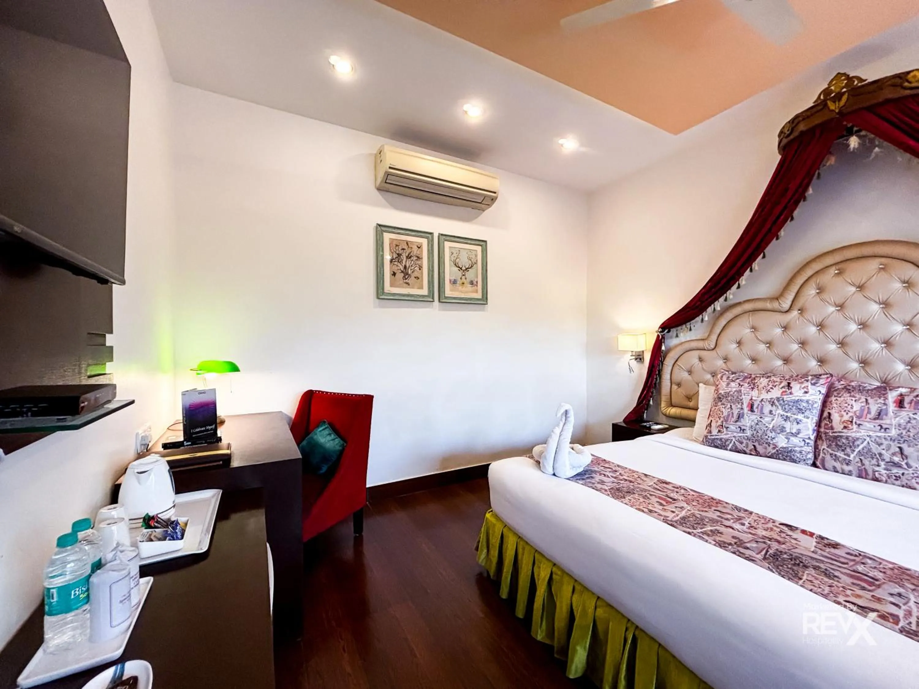 Bed in The Neeraj River Forest Resort Ayurvedic Wellness Center