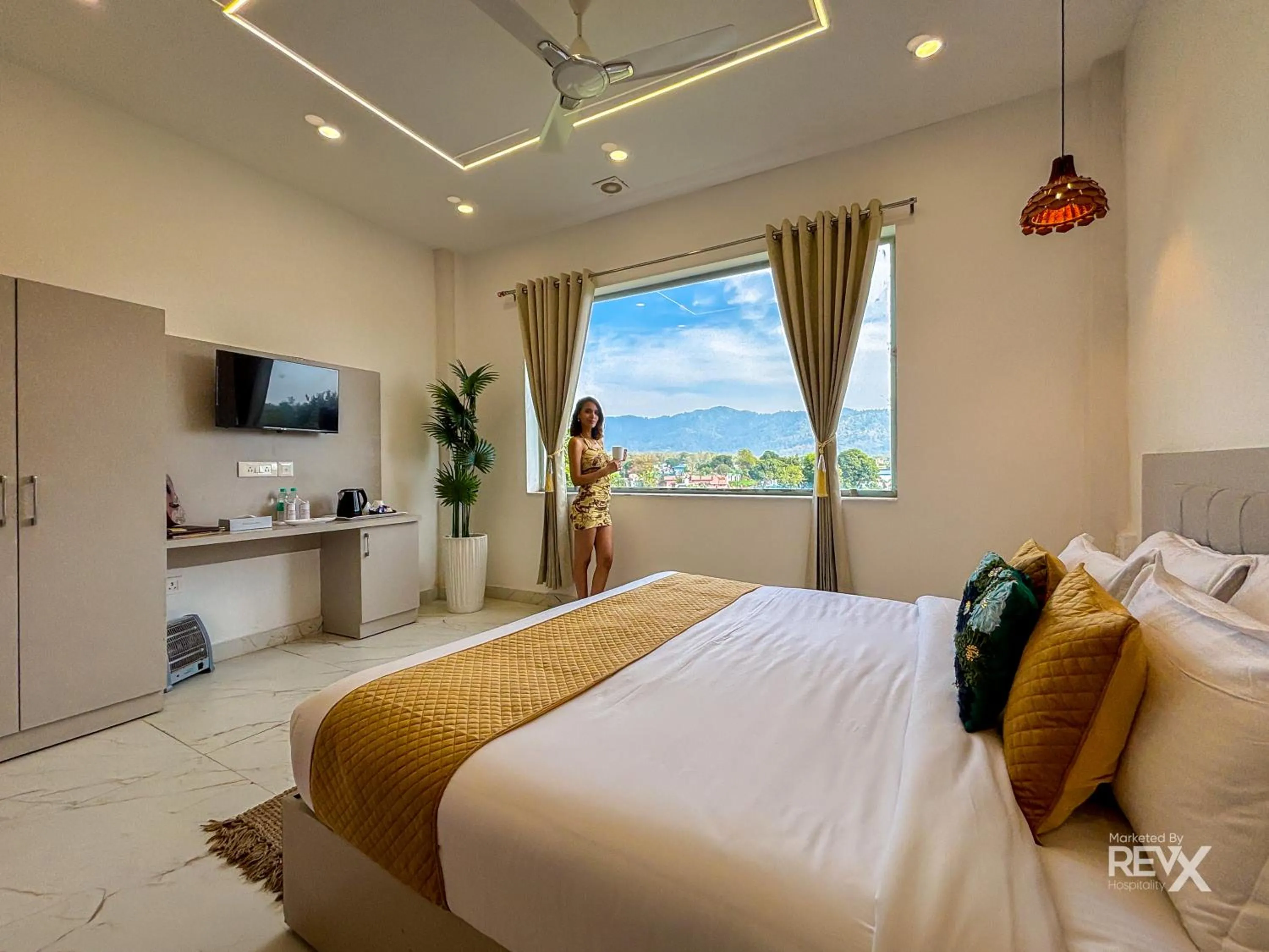 Bed in The Neeraj River Forest Resort Ayurvedic Wellness Center