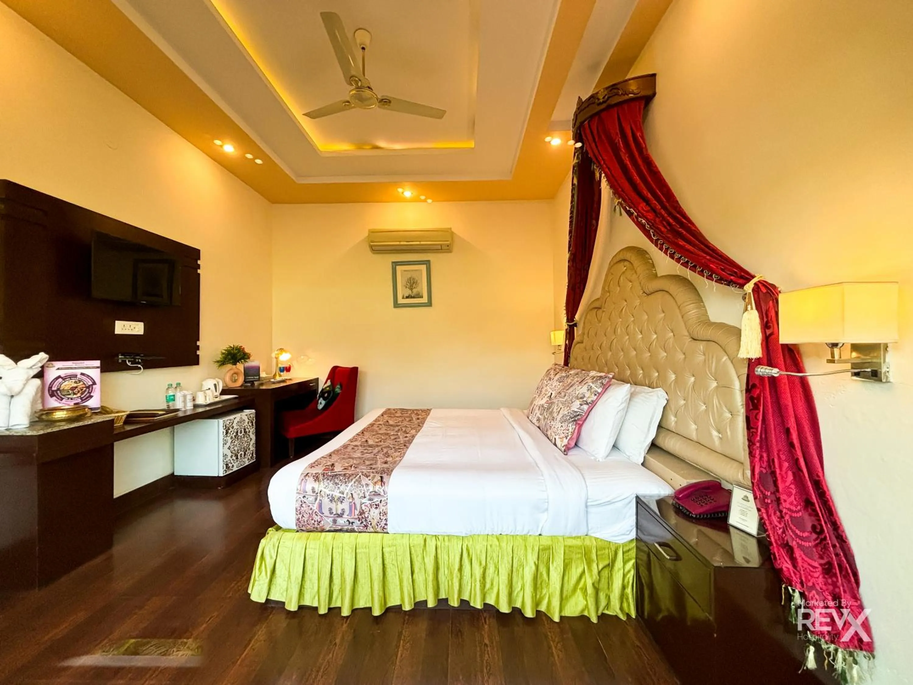 Bed in The Neeraj River Forest Resort Ayurvedic Wellness Center