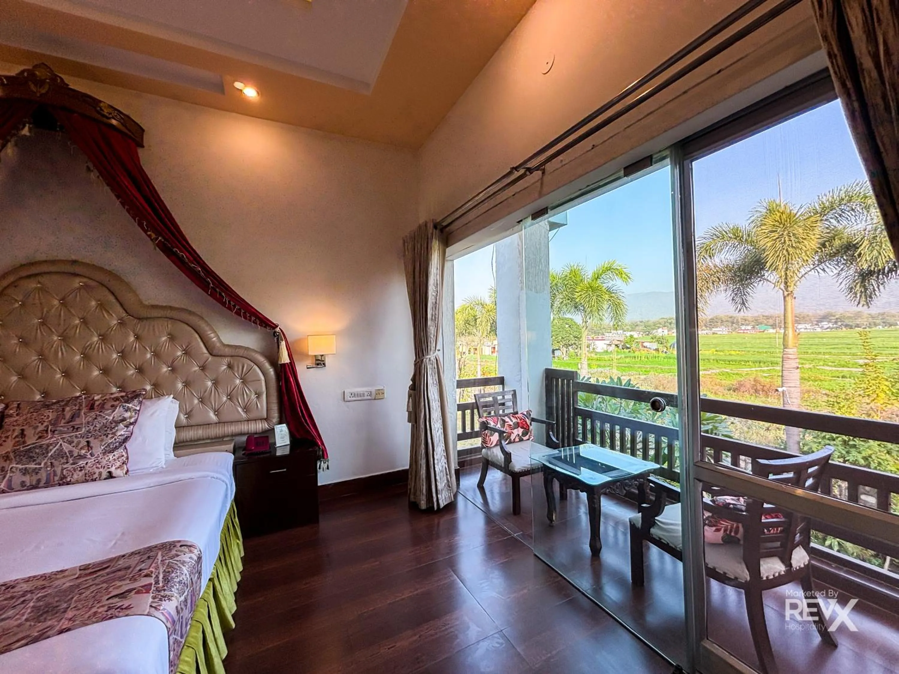 Bed in The Neeraj River Forest Resort Ayurvedic Wellness Center