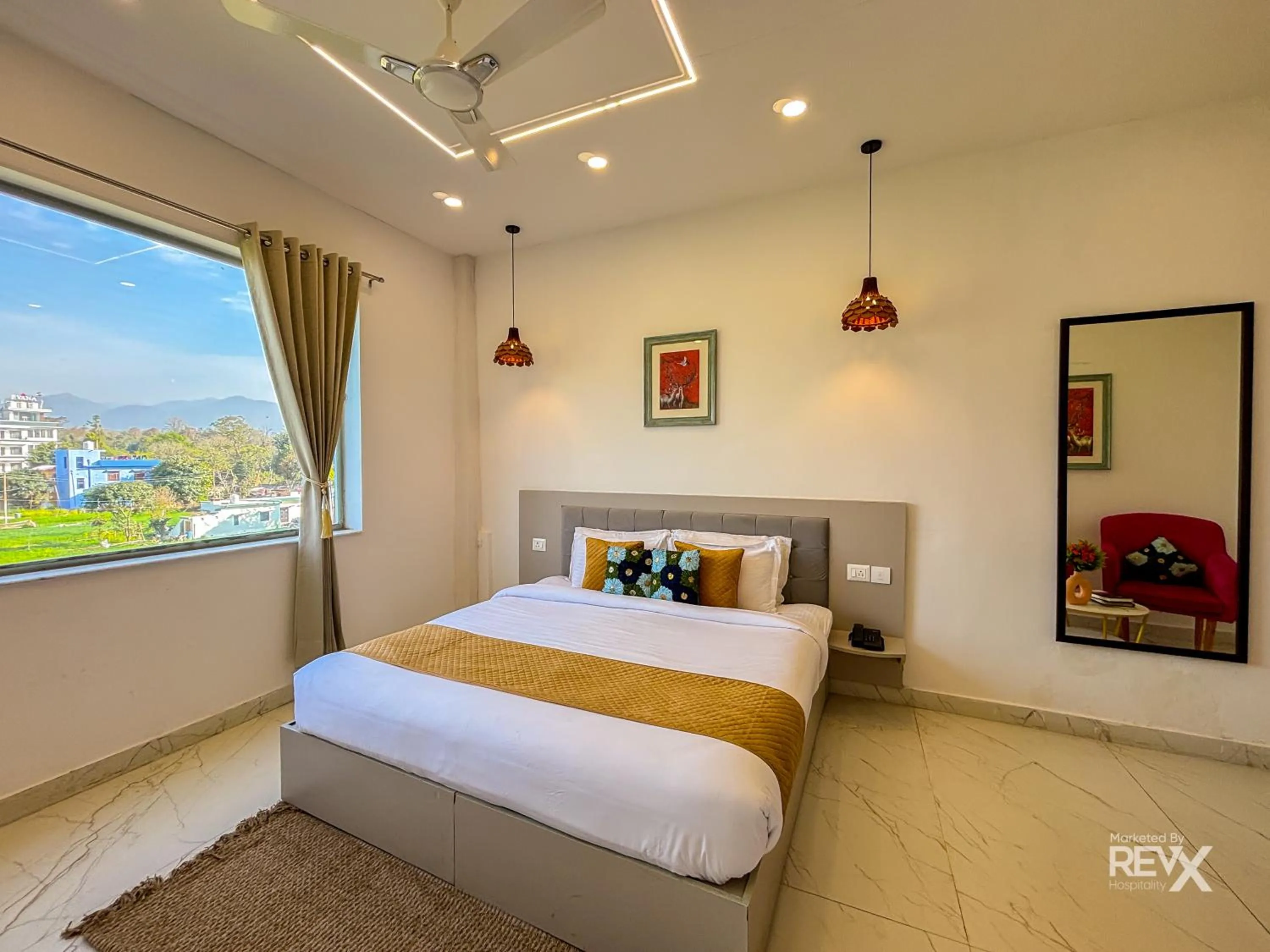 Bed in The Neeraj River Forest Resort Ayurvedic Wellness Center