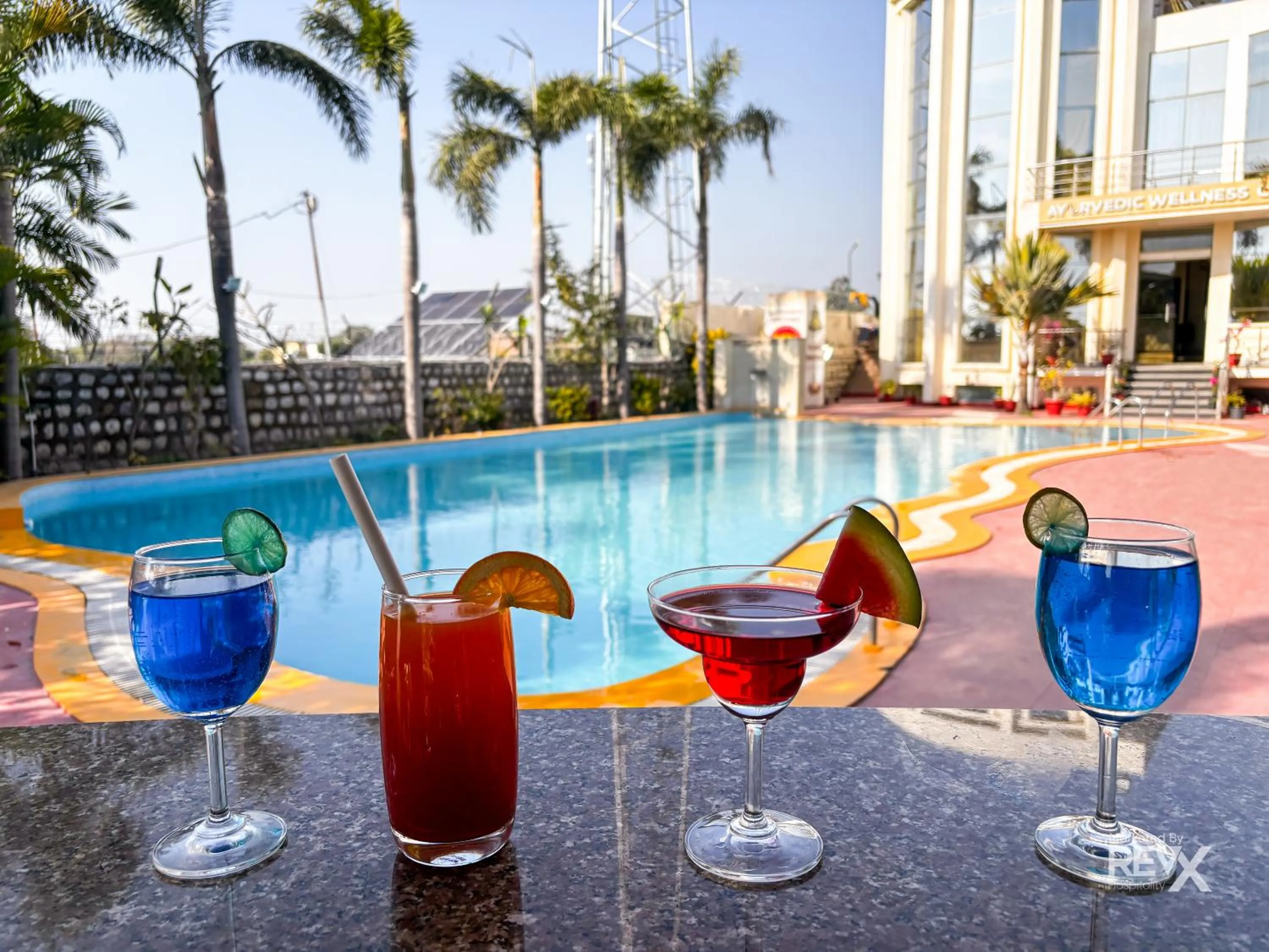 Swimming pool in The Neeraj River Forest Resort Ayurvedic Wellness Center